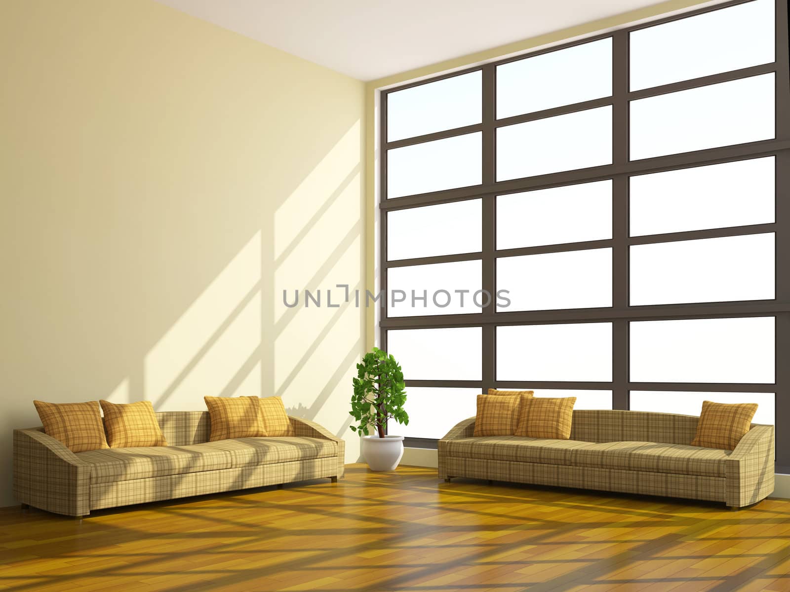 Brown sofas and plant near a window