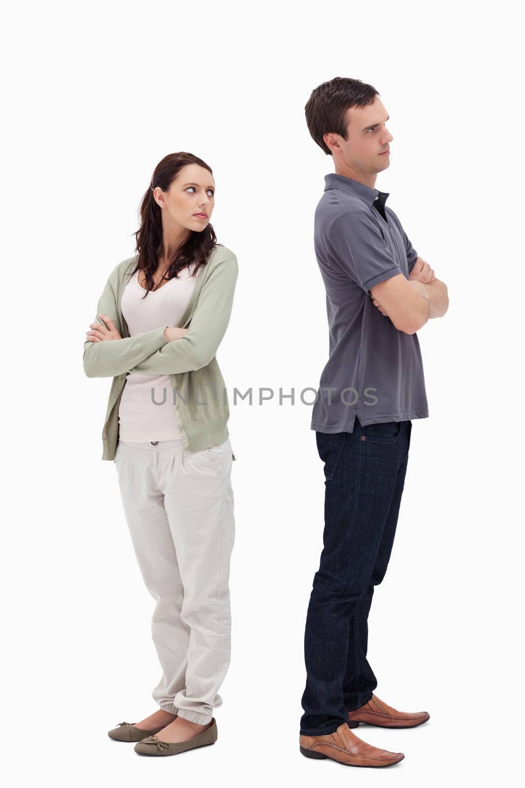 Couple in disagreement against white background