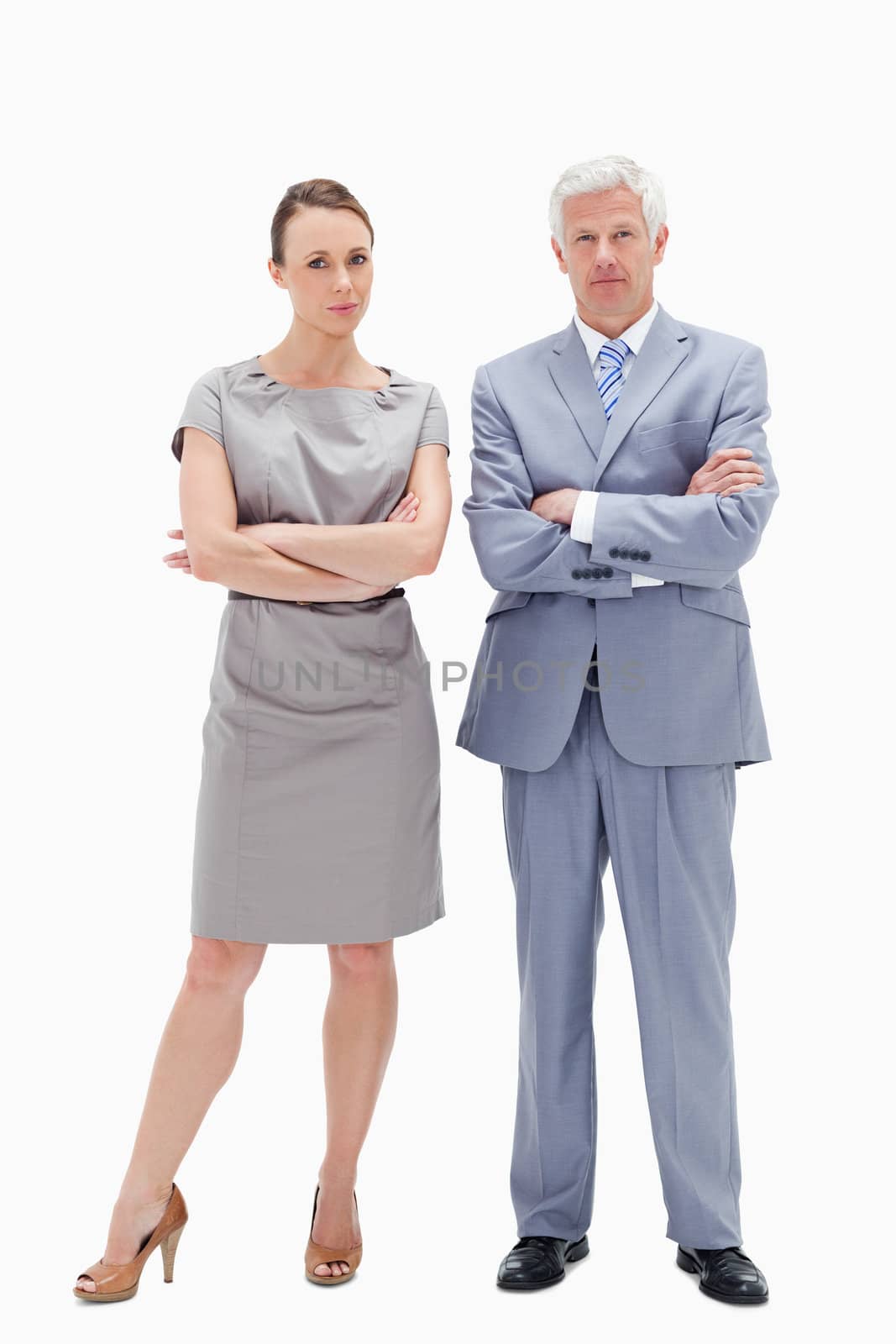 White hair man posing with woman crossing their arms against white background