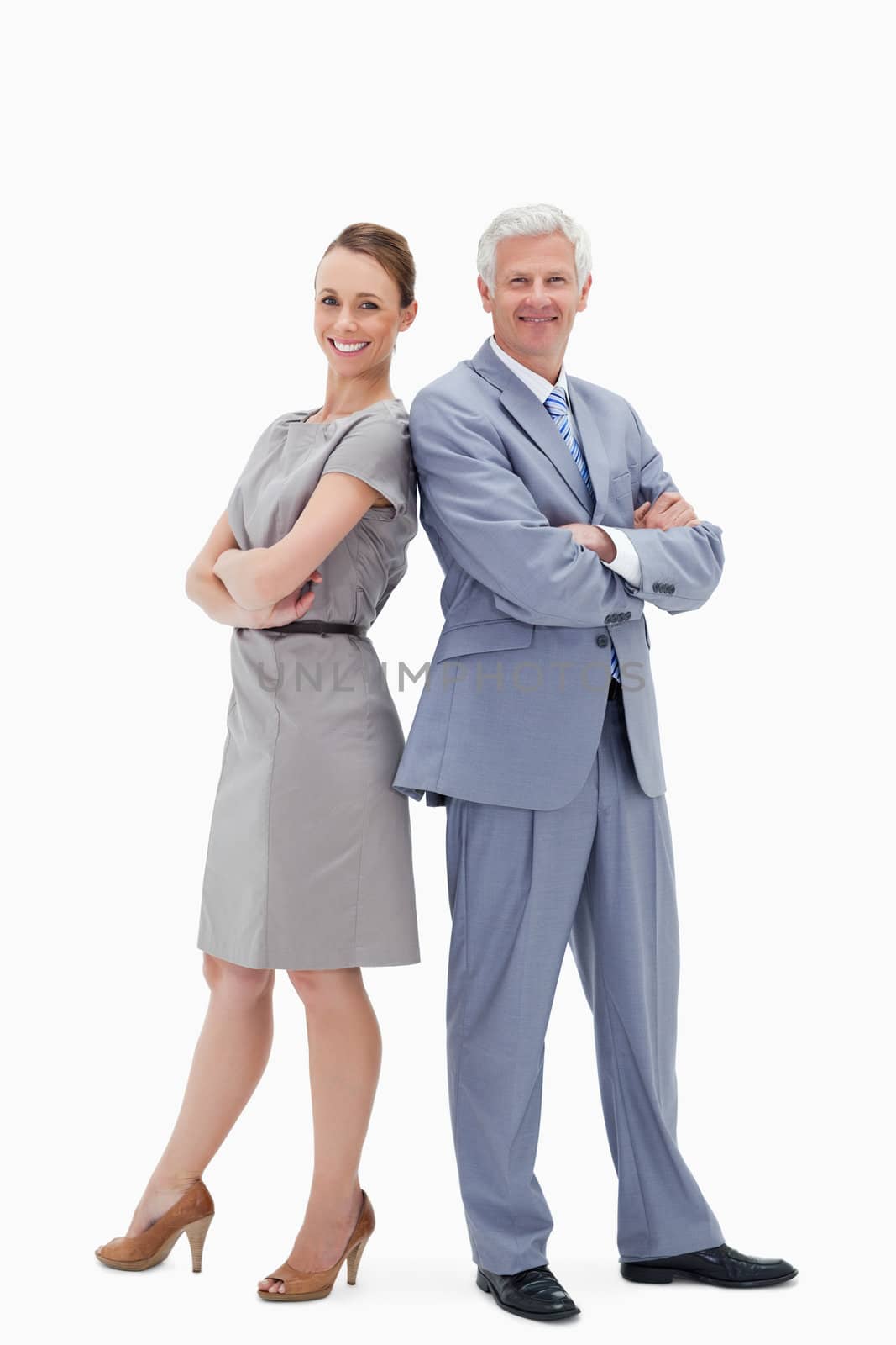 White hair businessman back to back with a woman and smiling against white background