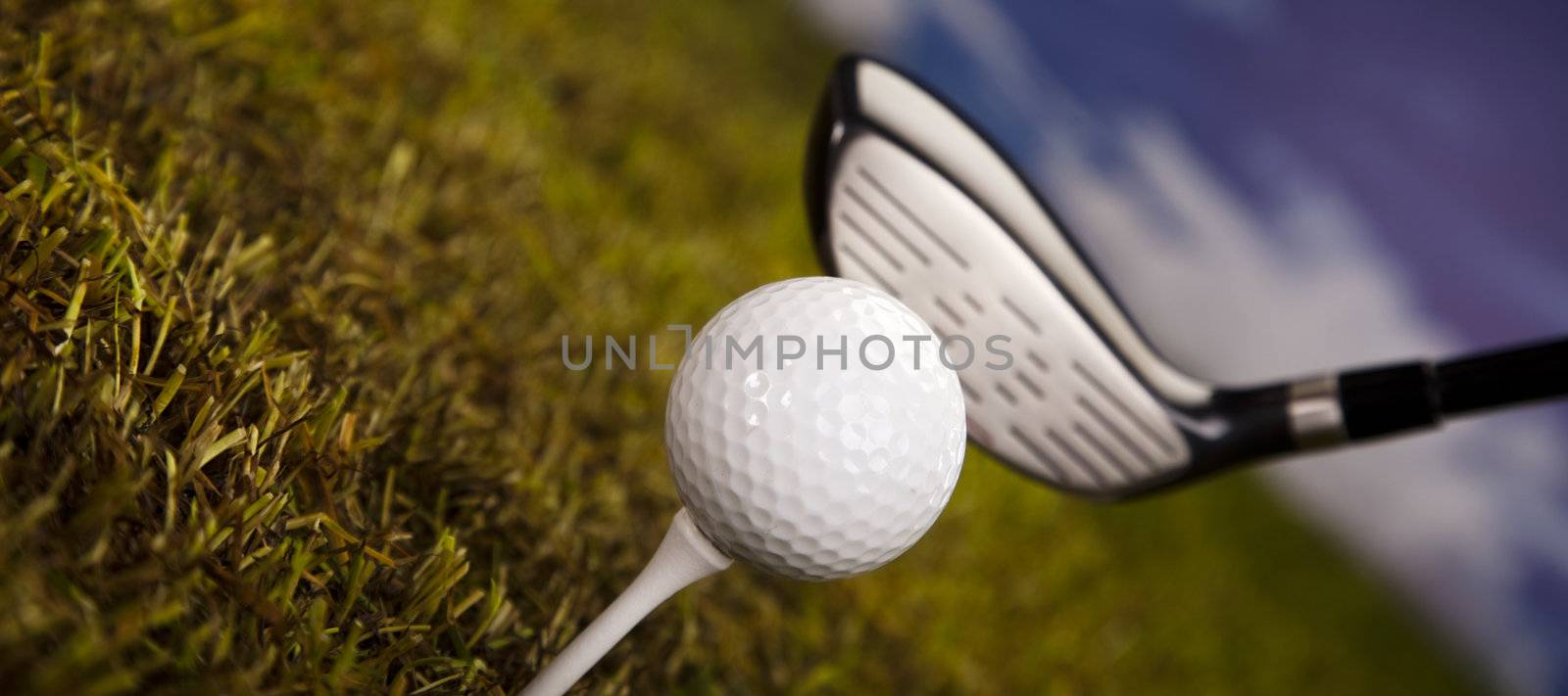 Golf ball on tee in driver by JanPietruszka