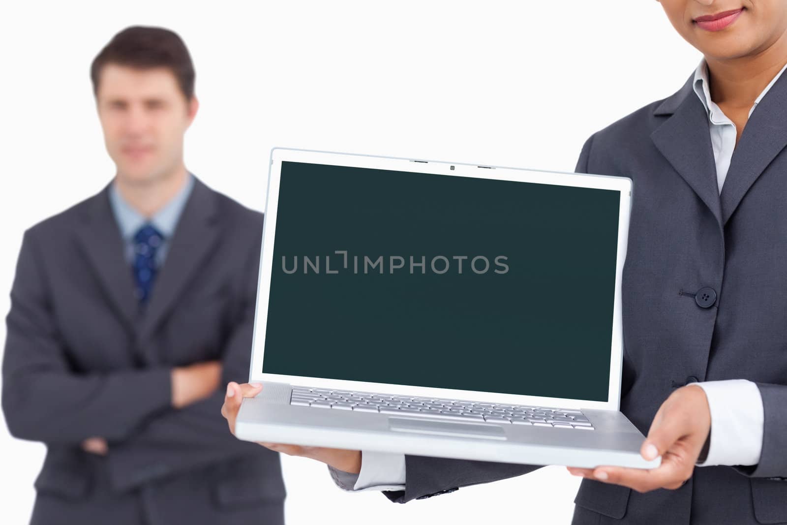 Close up of laptop screen being presented by salesteam against a white background