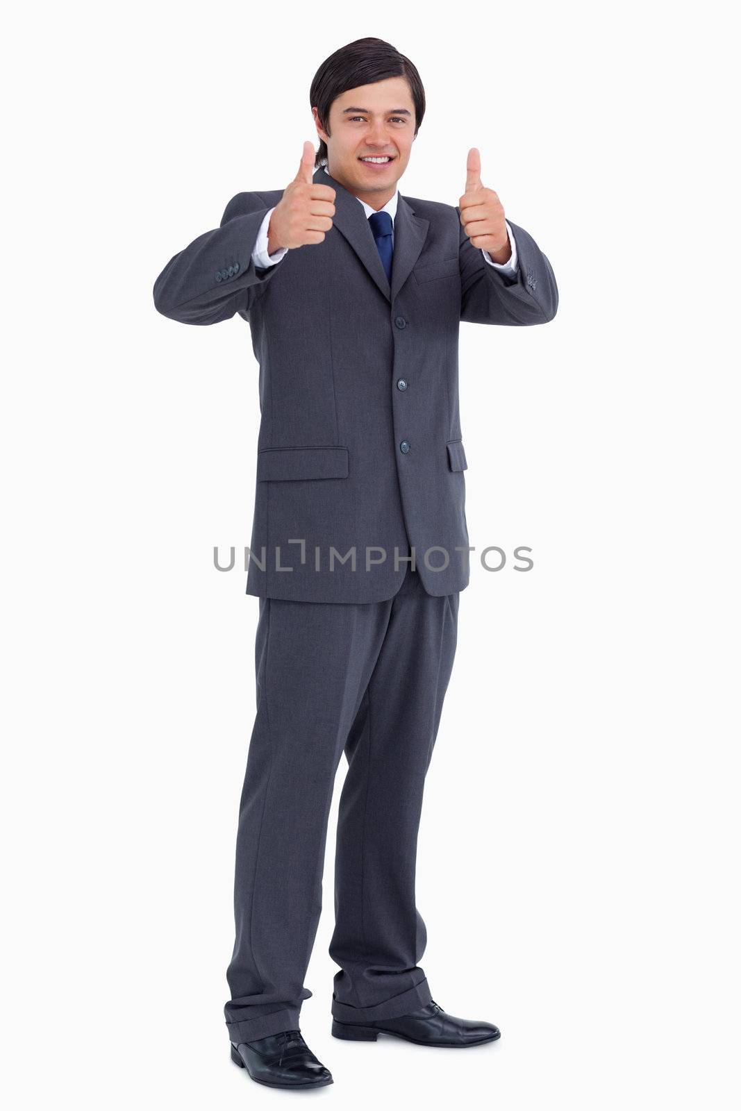Tradesman giving thumbs up against a white background