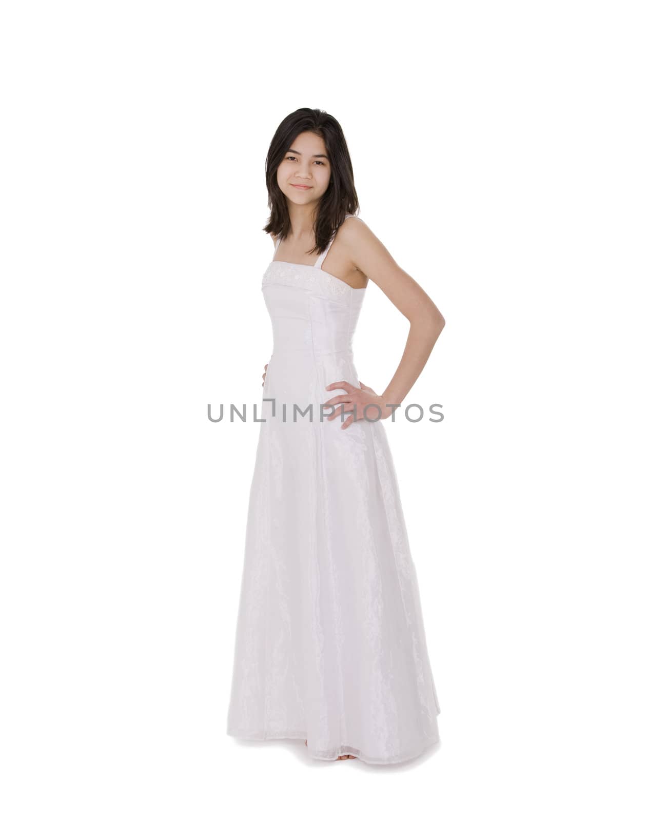 Beautiful young teen girl in white dress or gown, isolated on white
