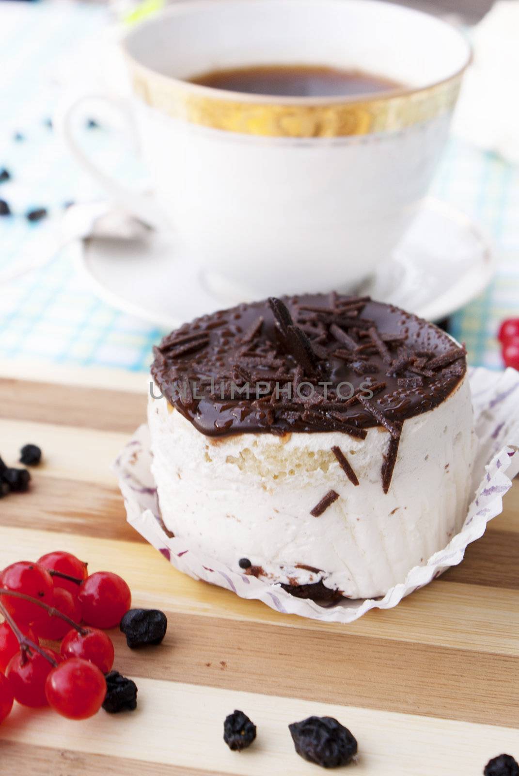 Sweet appetizing fresh fruitcake biscuit and morning black coffee