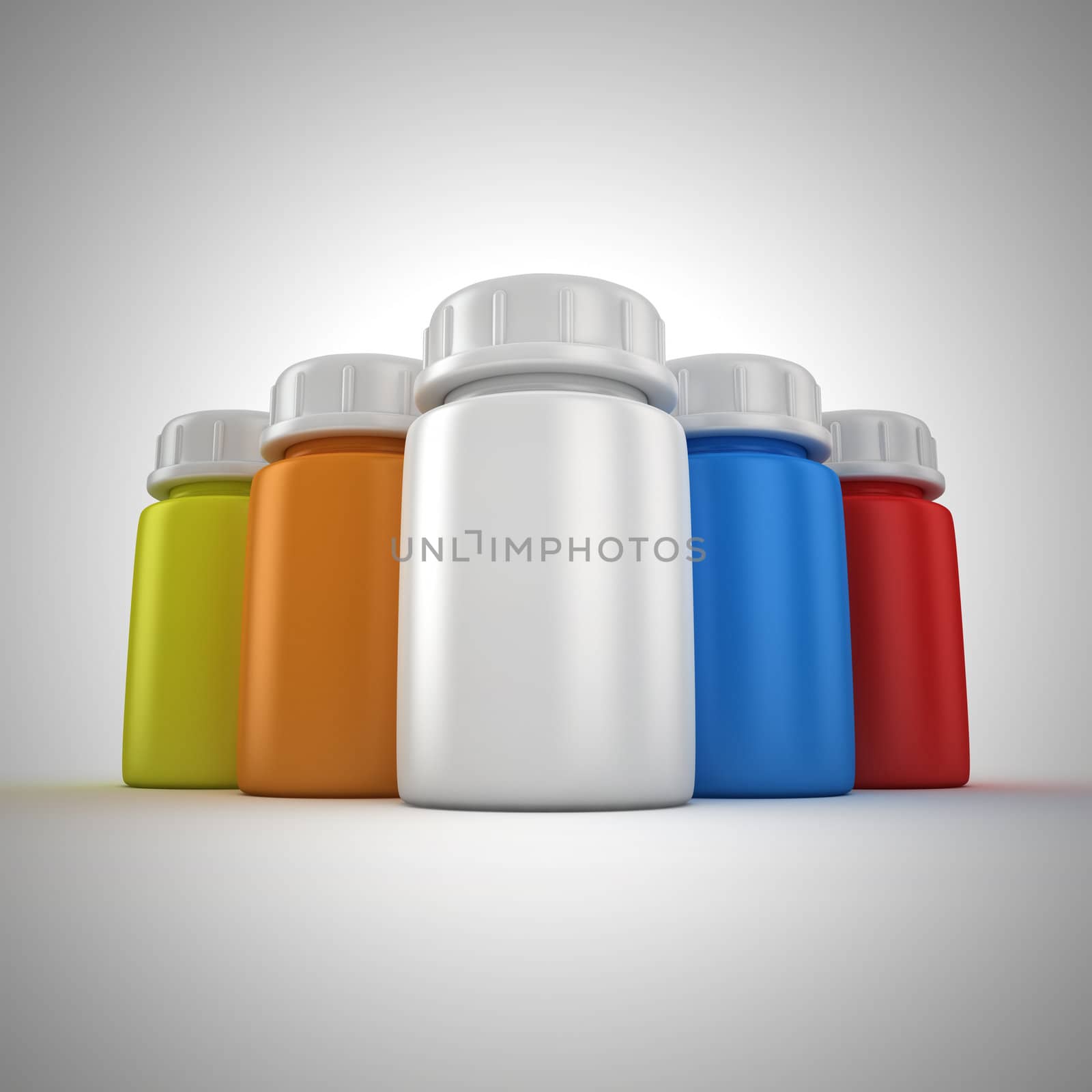 Group of multicolored pill containers