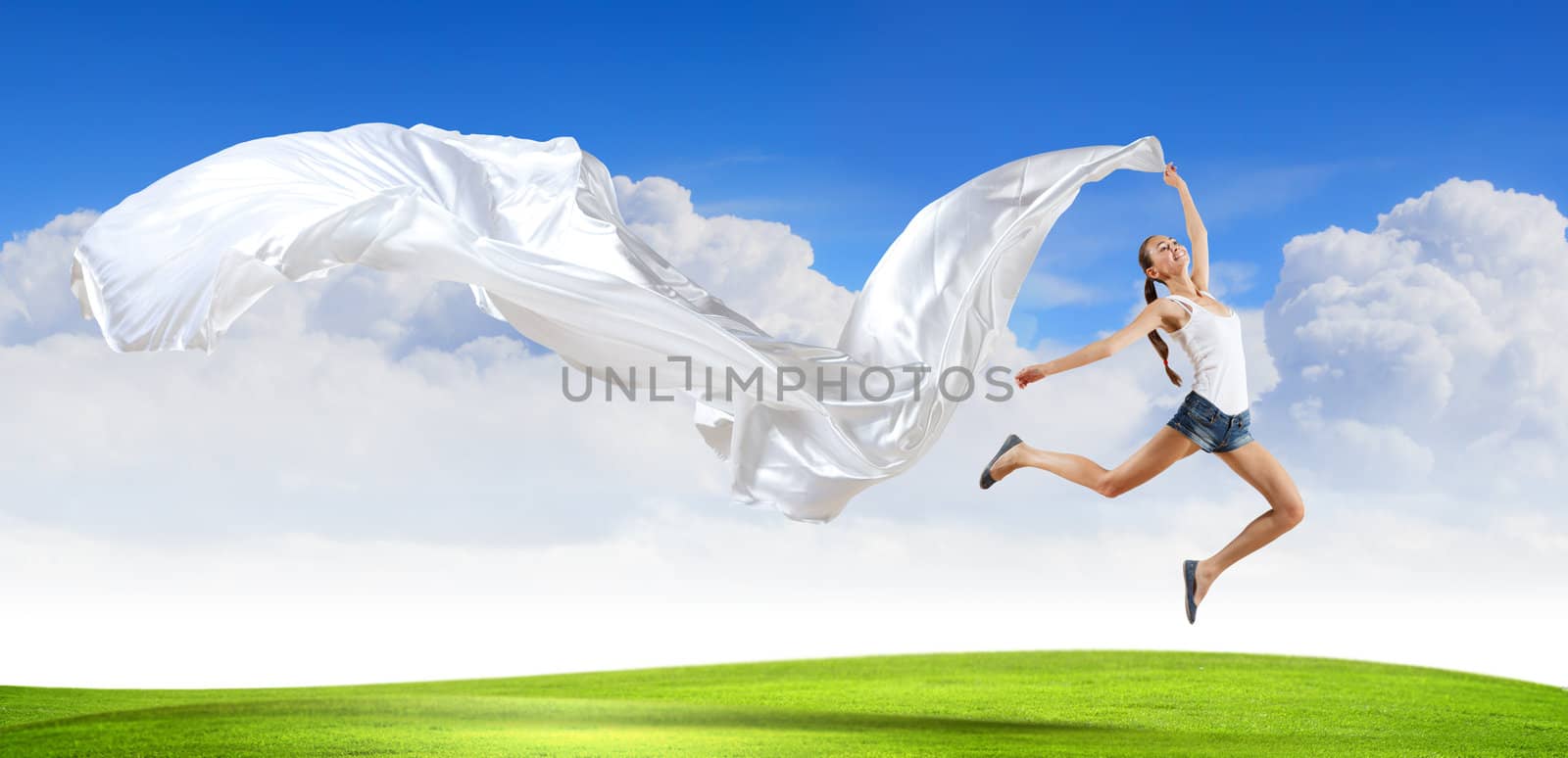 Modern style dancer against blue sky by sergey_nivens