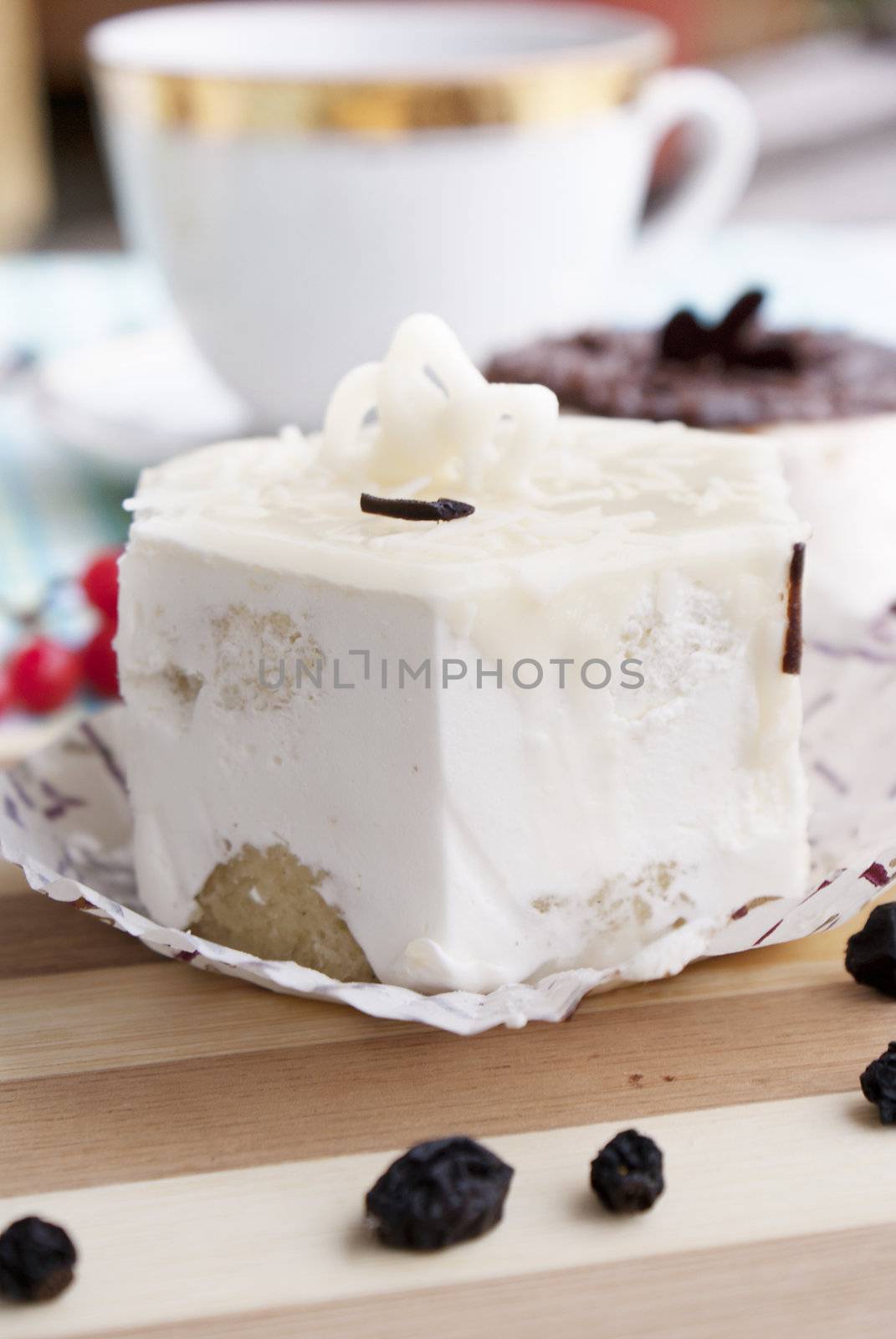 Sweet appetizing fresh fruitcake biscuit and morning black coffee