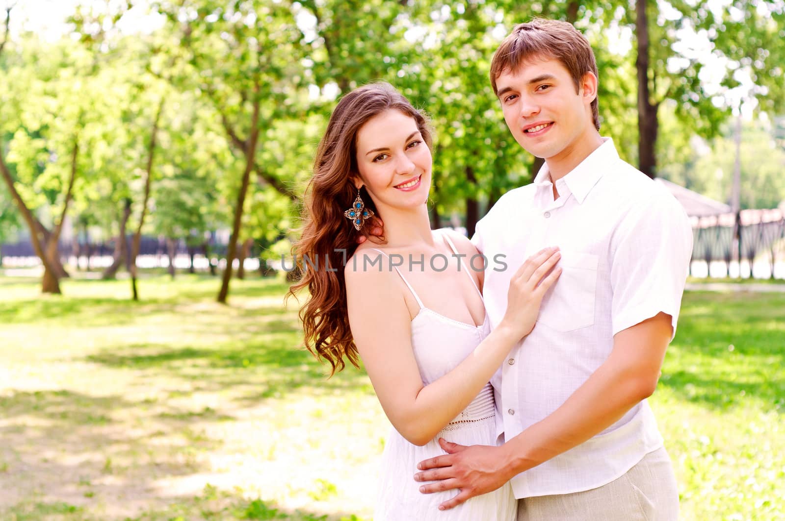 couple hugging in the park, have a good time together