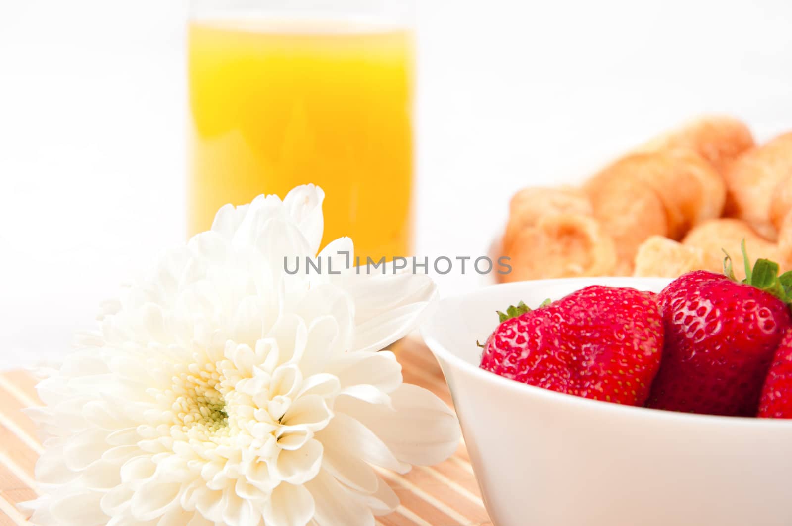 Breakfast with berries,orange juice and croissant, early breakfast