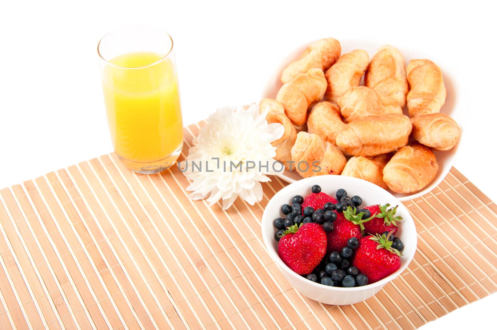 Breakfast with berries,orange juice and croissant by adam121