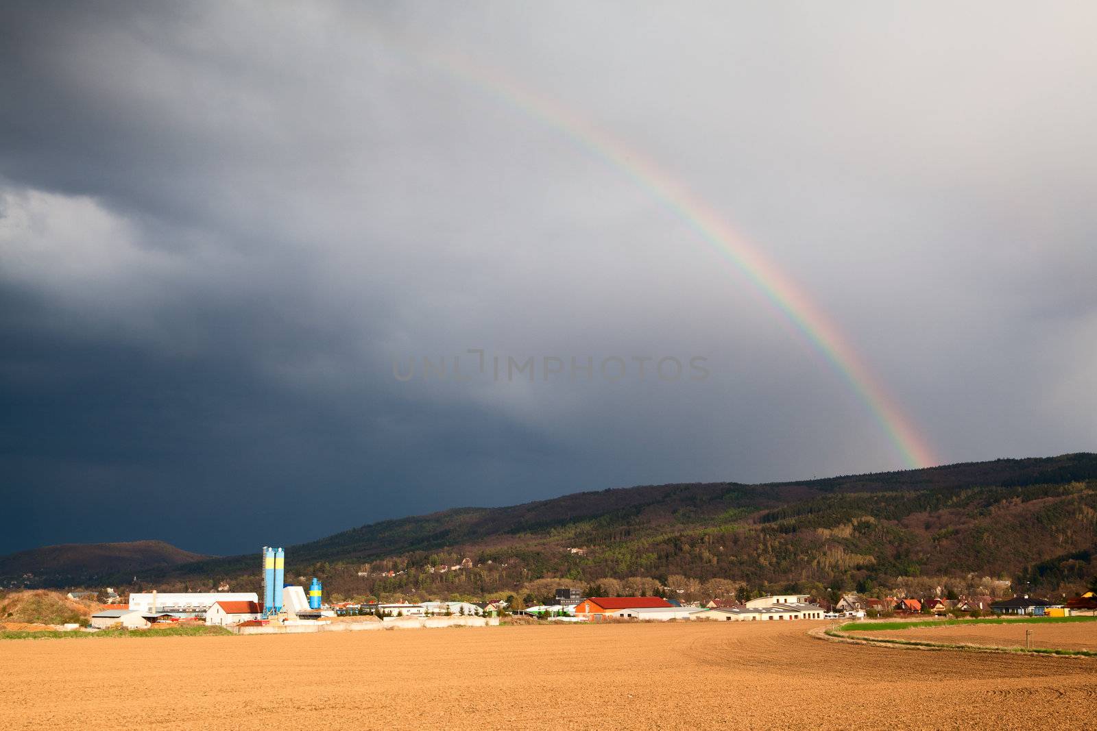 Natural rainbow over Dobrichovice in Czech Republic