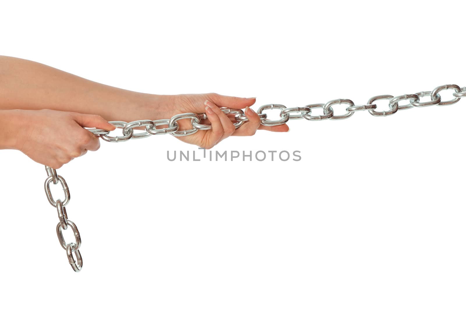 Woman pulling a long heavy metal chain