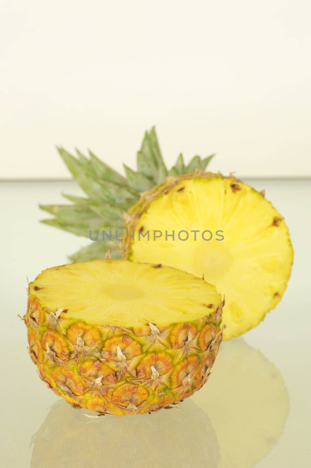 Delicious sweet ripe pineapple cut in half.