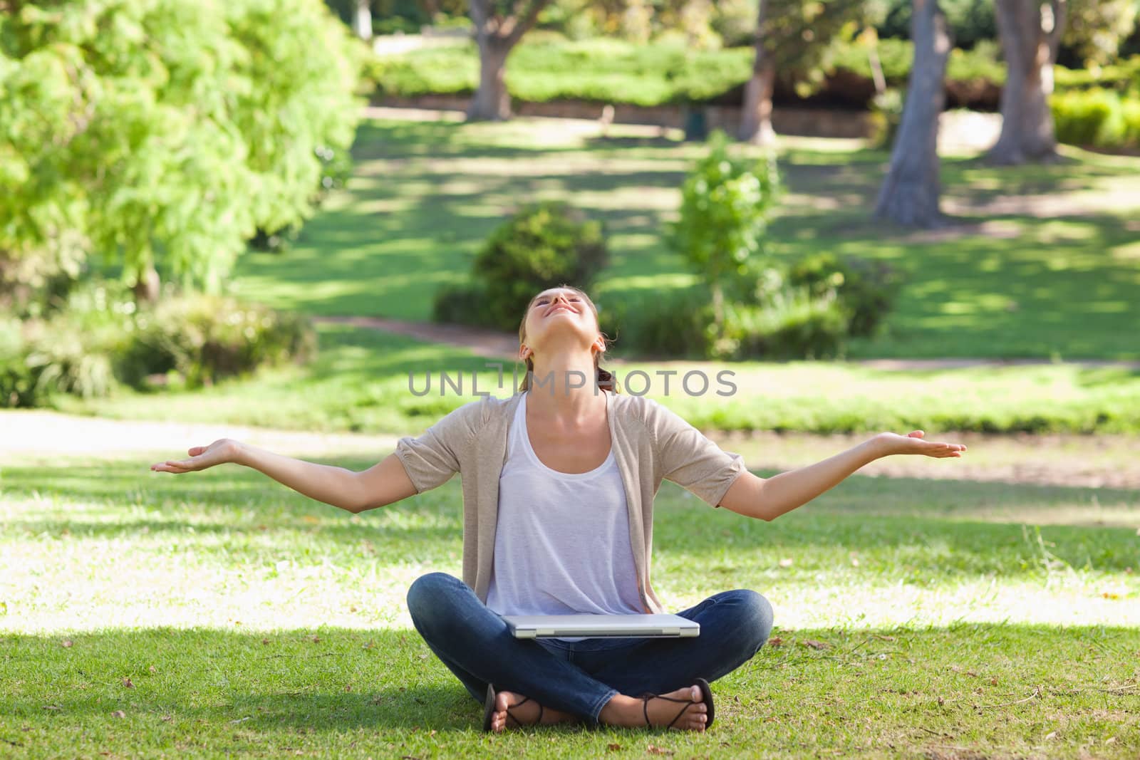 Young woman in the park enjoying the day