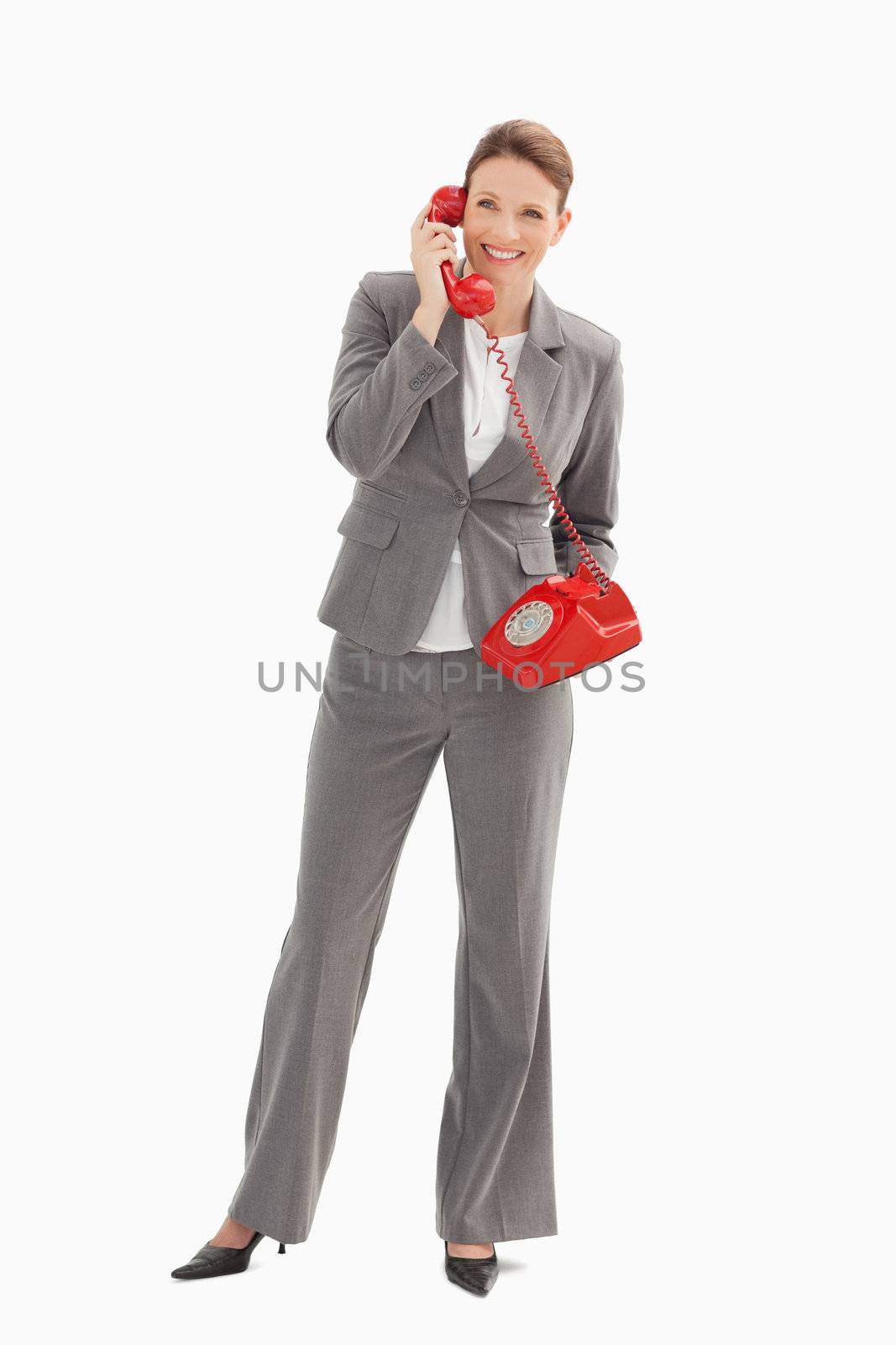 A businesswoman is talking on the phone