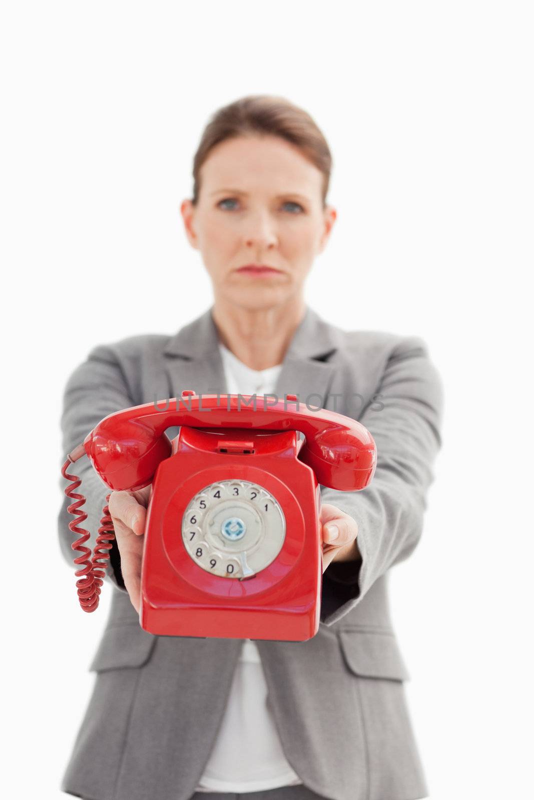 angry businesswoman holding a phone by Wavebreakmedia