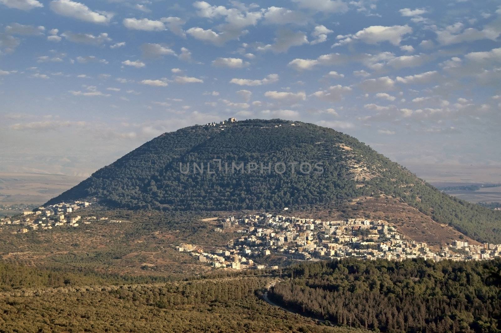 biblical Mount Tabor and the Arab village by irisphoto4