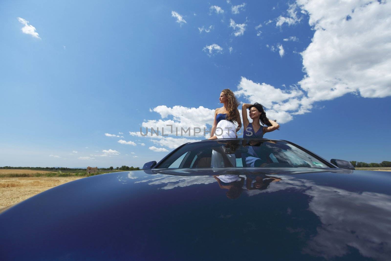 women dance in car by Yellowj