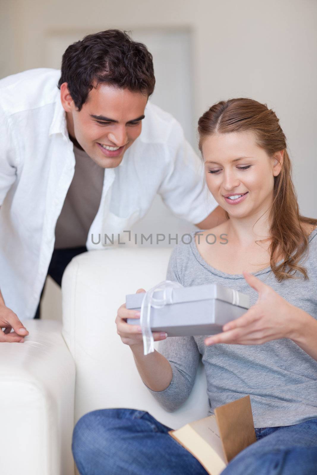 Young woman with the present she just got from her boyfriend