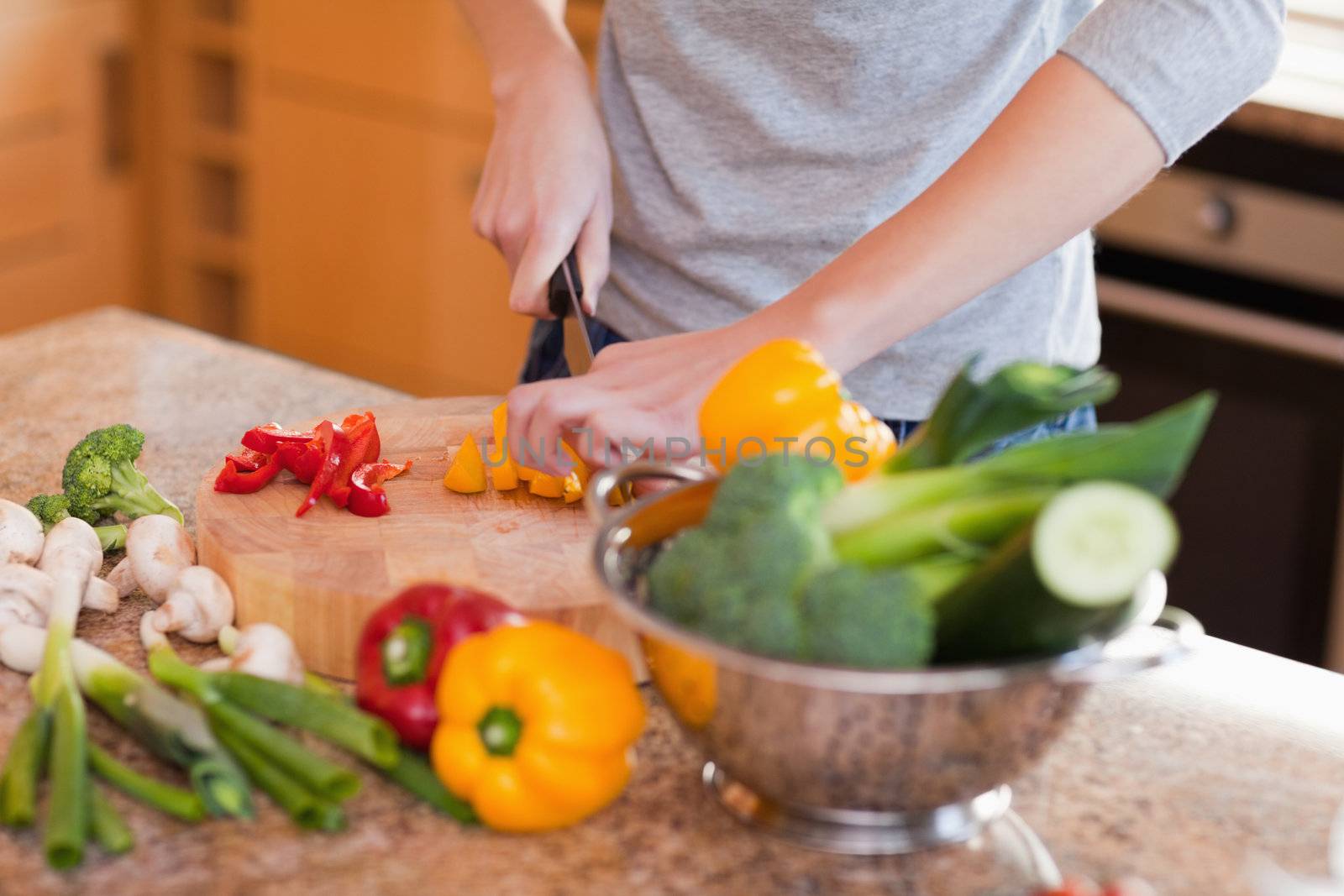 Vegetables being cut into pieces