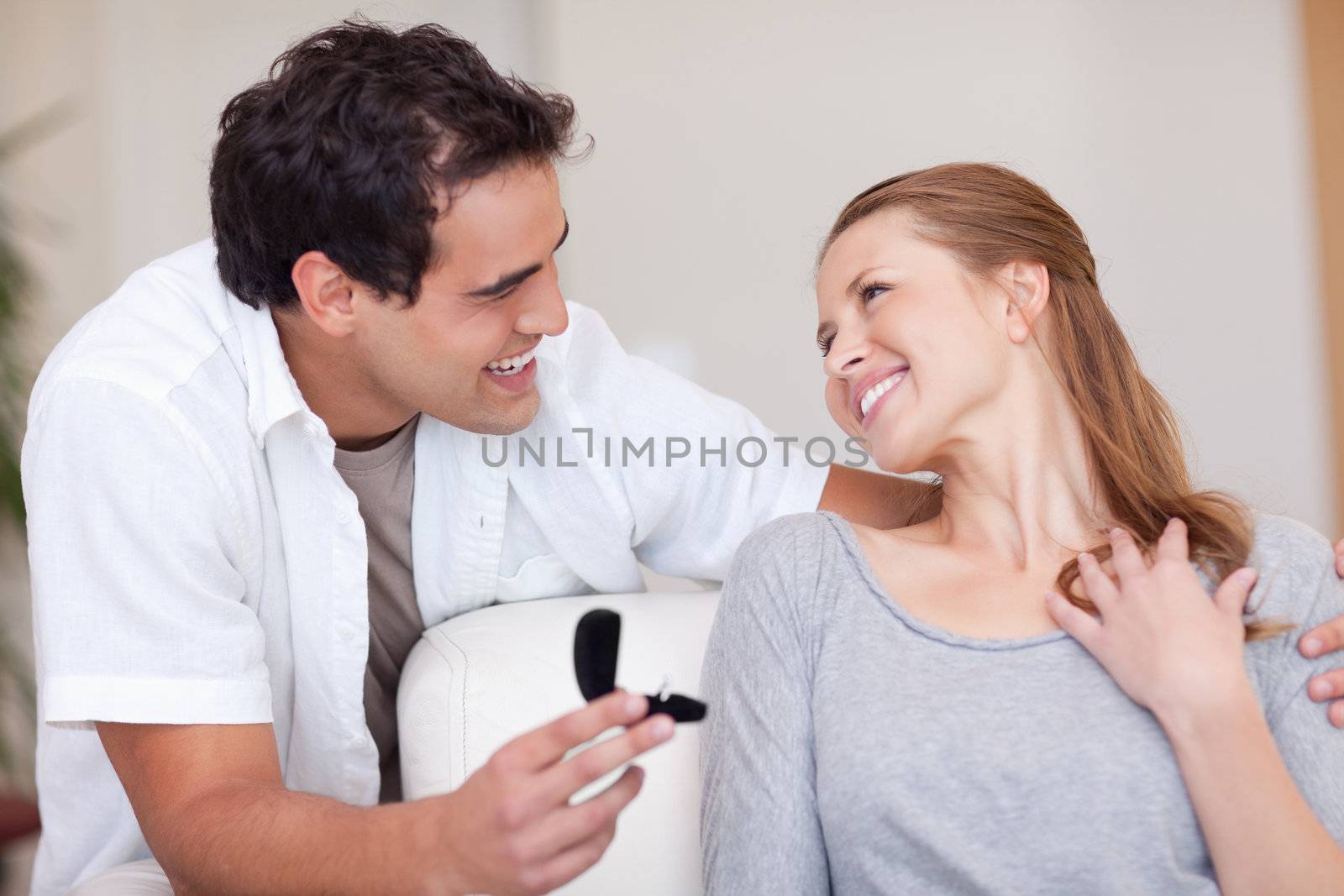 Happy smiling couple just got engaged
