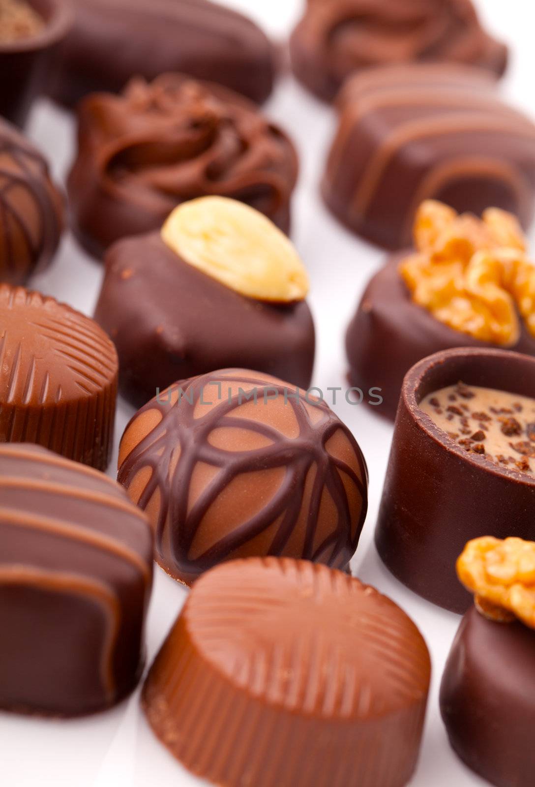 Delicious Chocolate Pralines , On White Background by motorolka