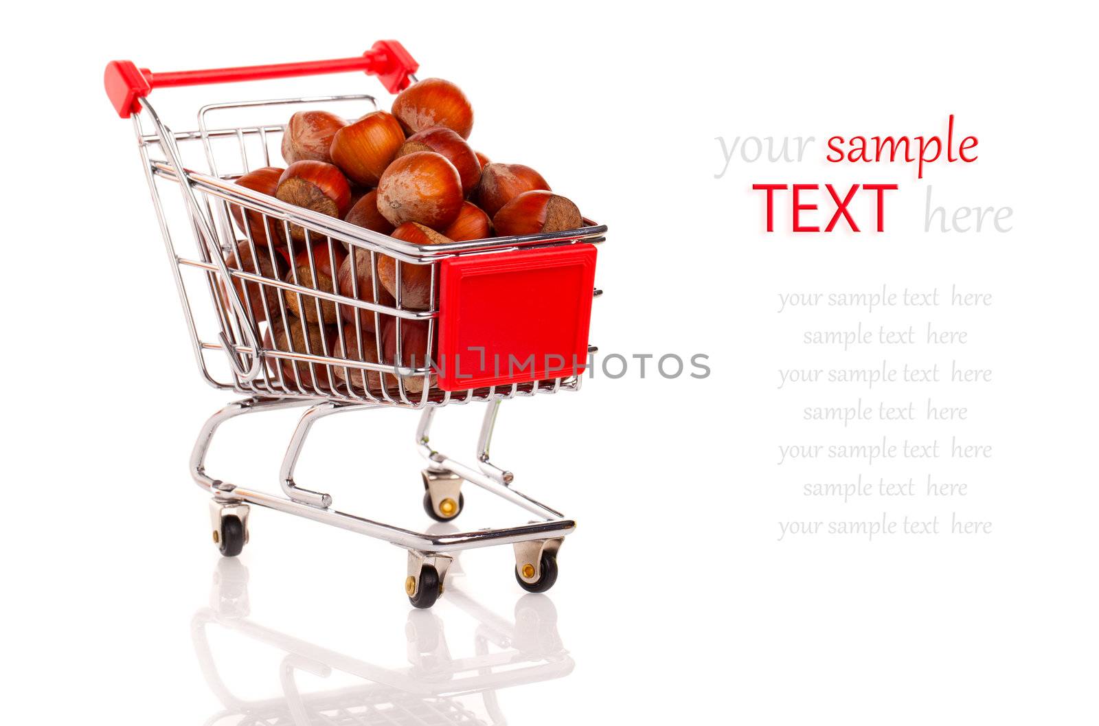 a Shopping cart full of hazelnut, on a white background
