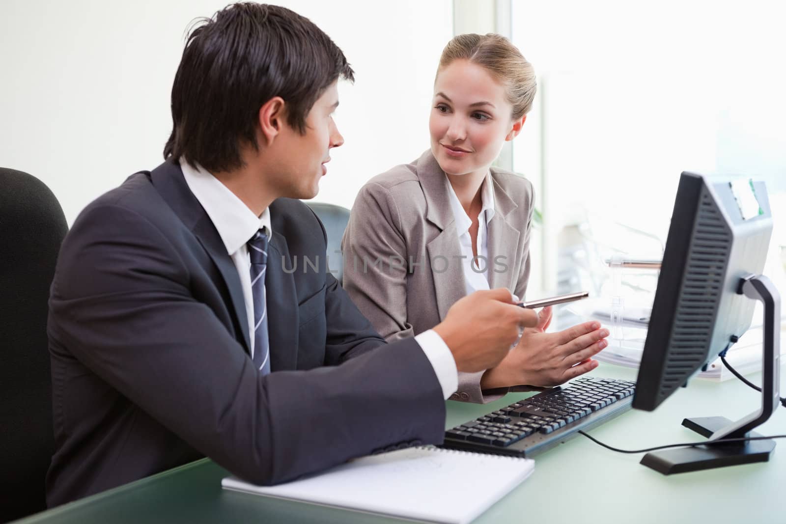 Business team working with a computer in an office