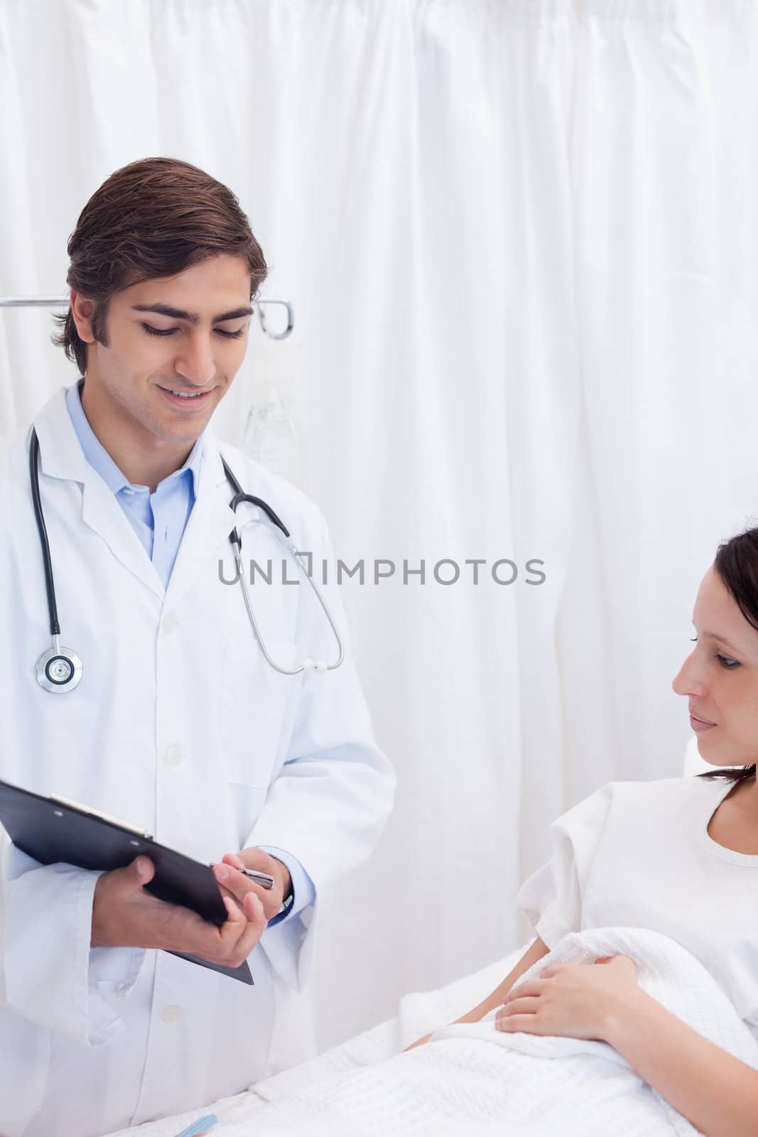 Young patient and doctor talking about examination results
