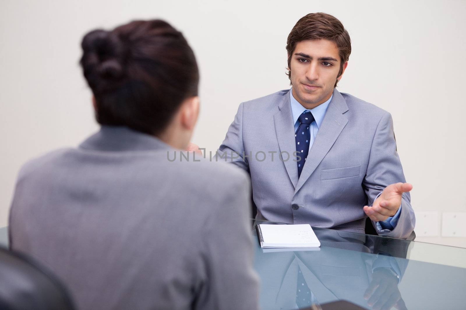 Young business people negotiating