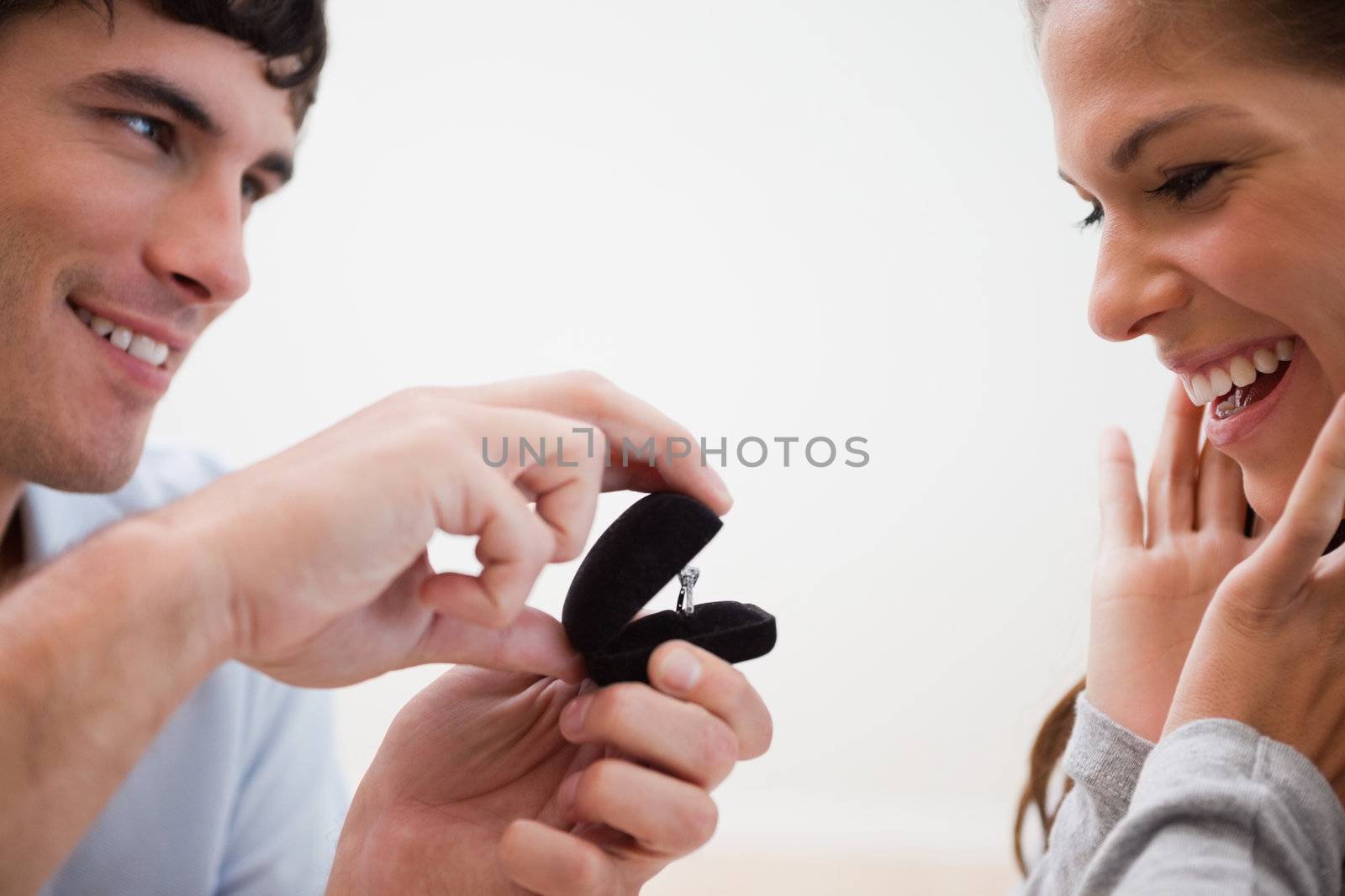 Close up of young man making a proposal of marriage