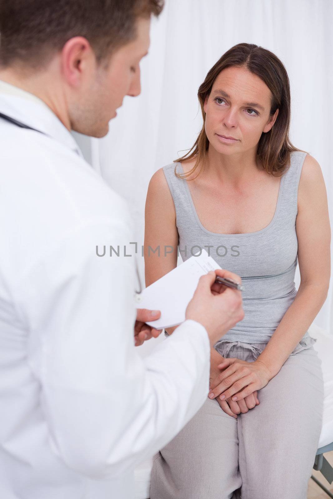 Doctor explaining further steps to his patient