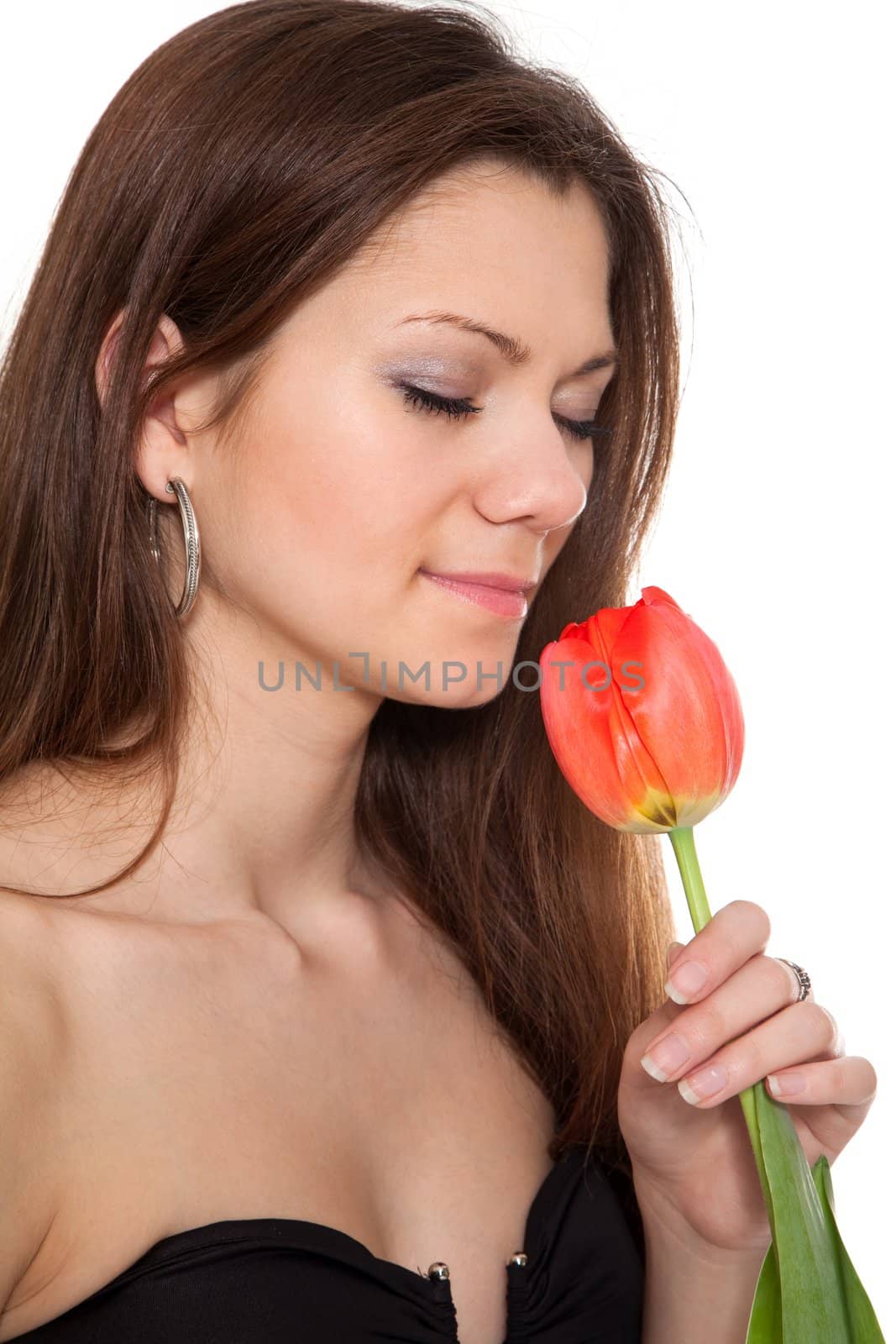 Beauty girl holding single tulip isolated on white background