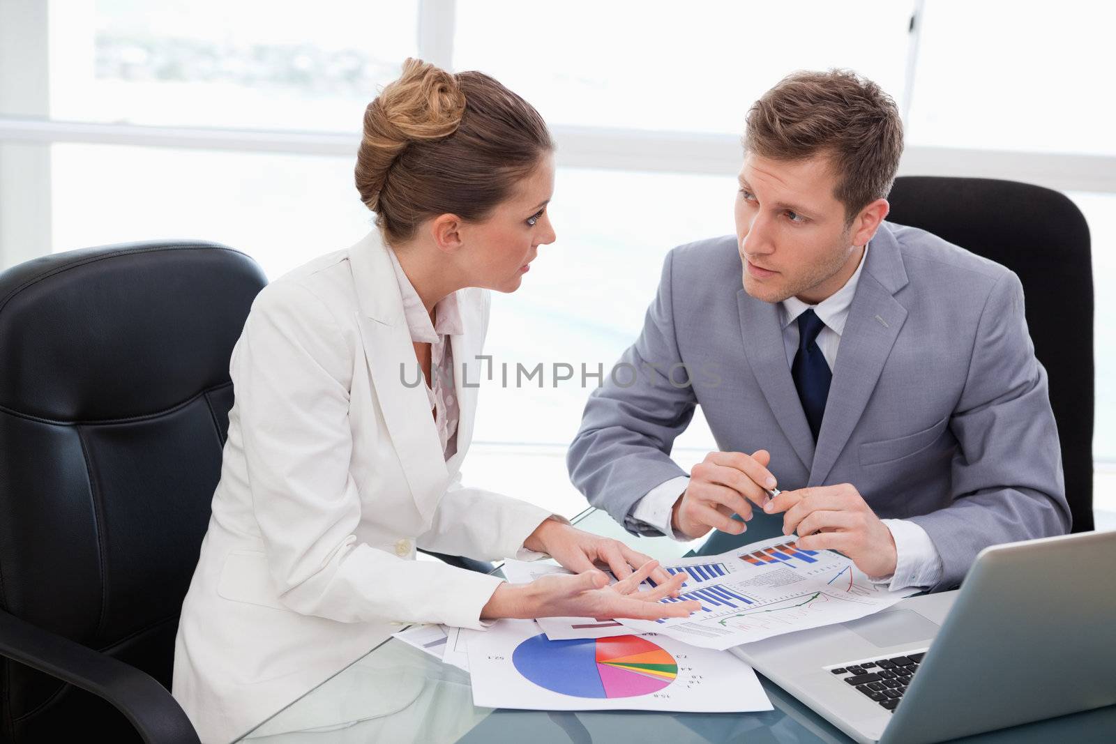Business team talking about market research results