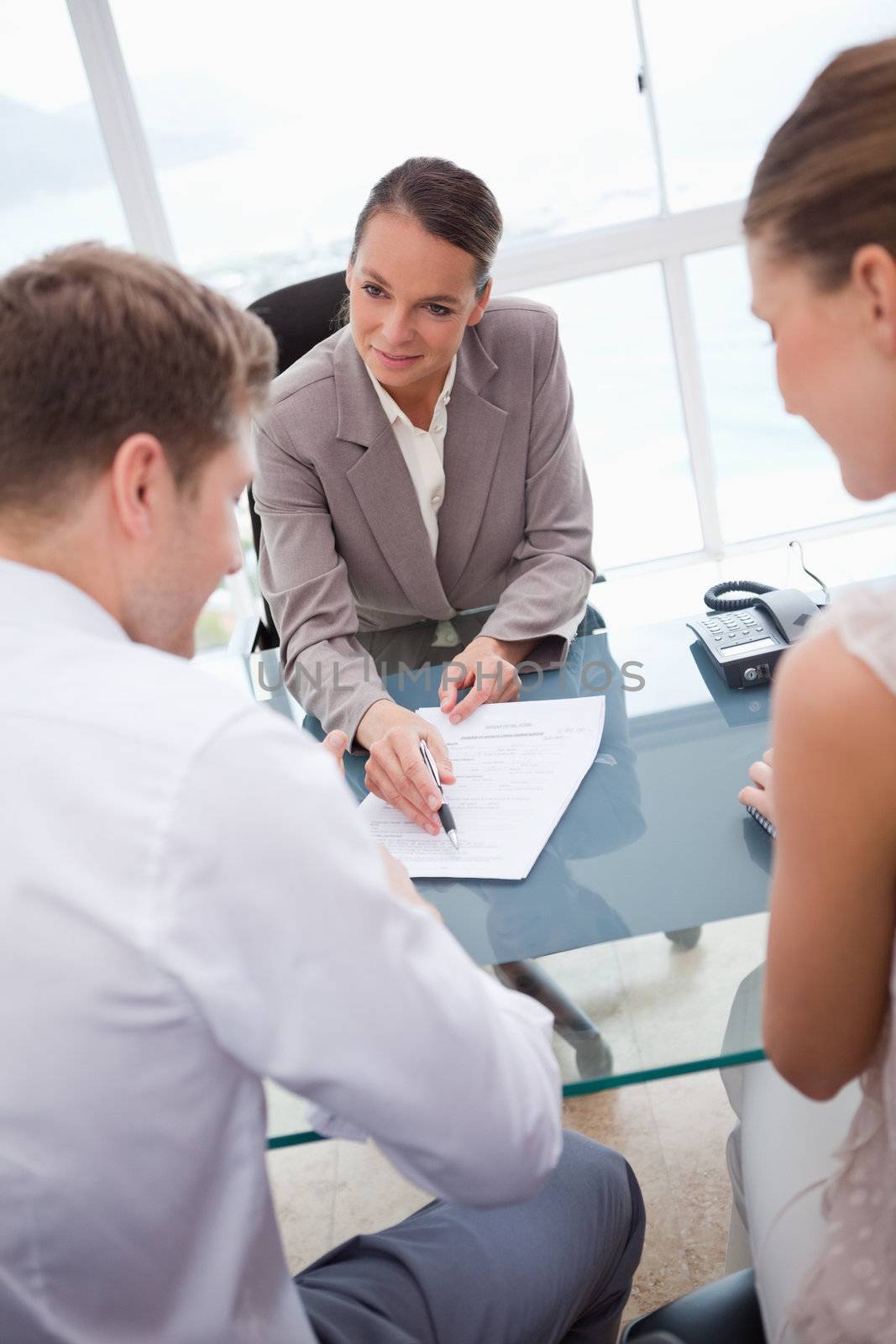 Businesswoman making an offer to negotiation partners