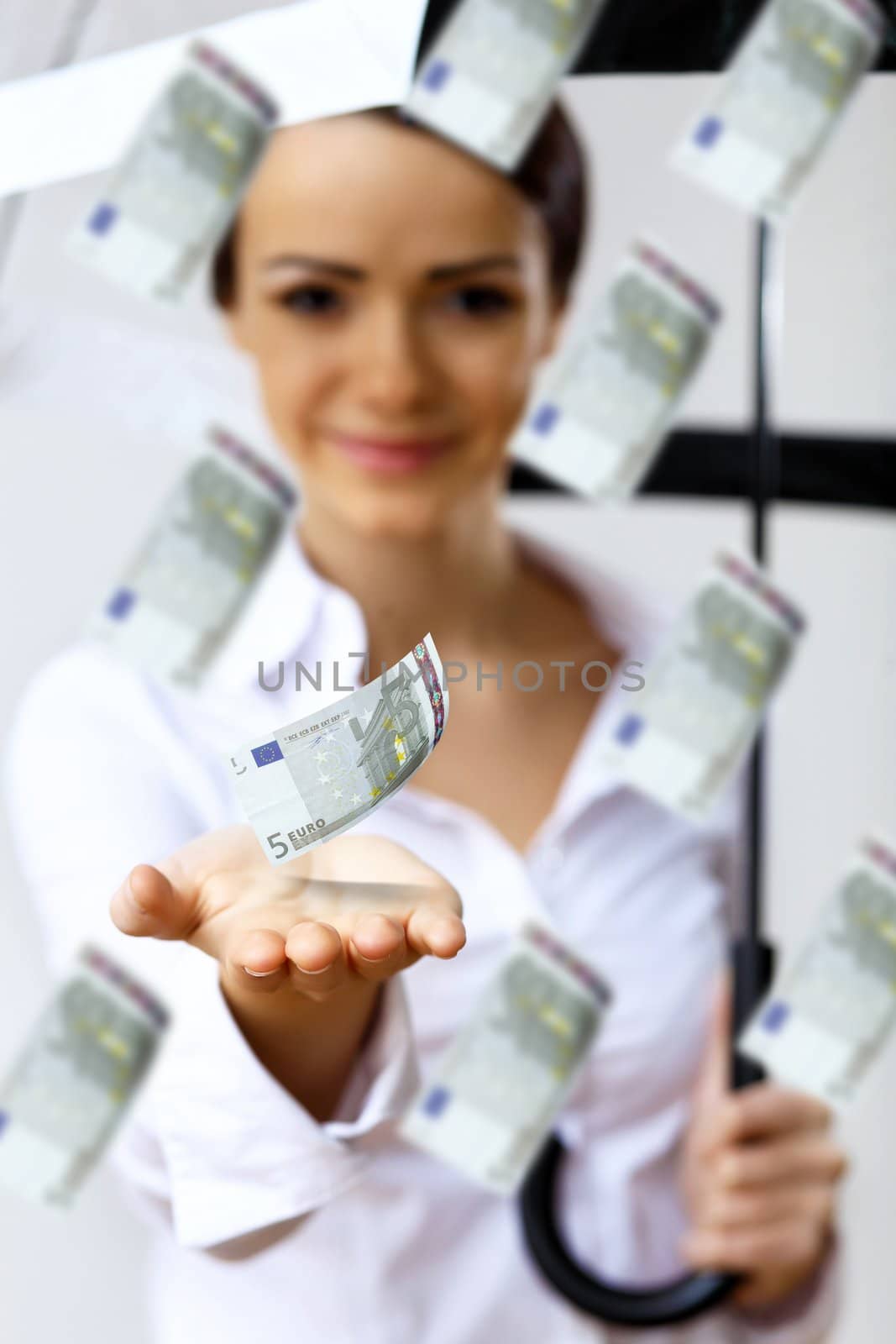 Collage with business woman under money rain with umbrella