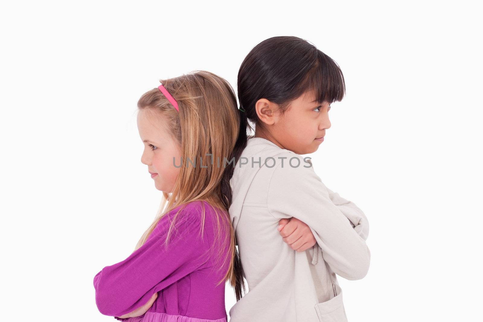 Girls mad at each other against a white background