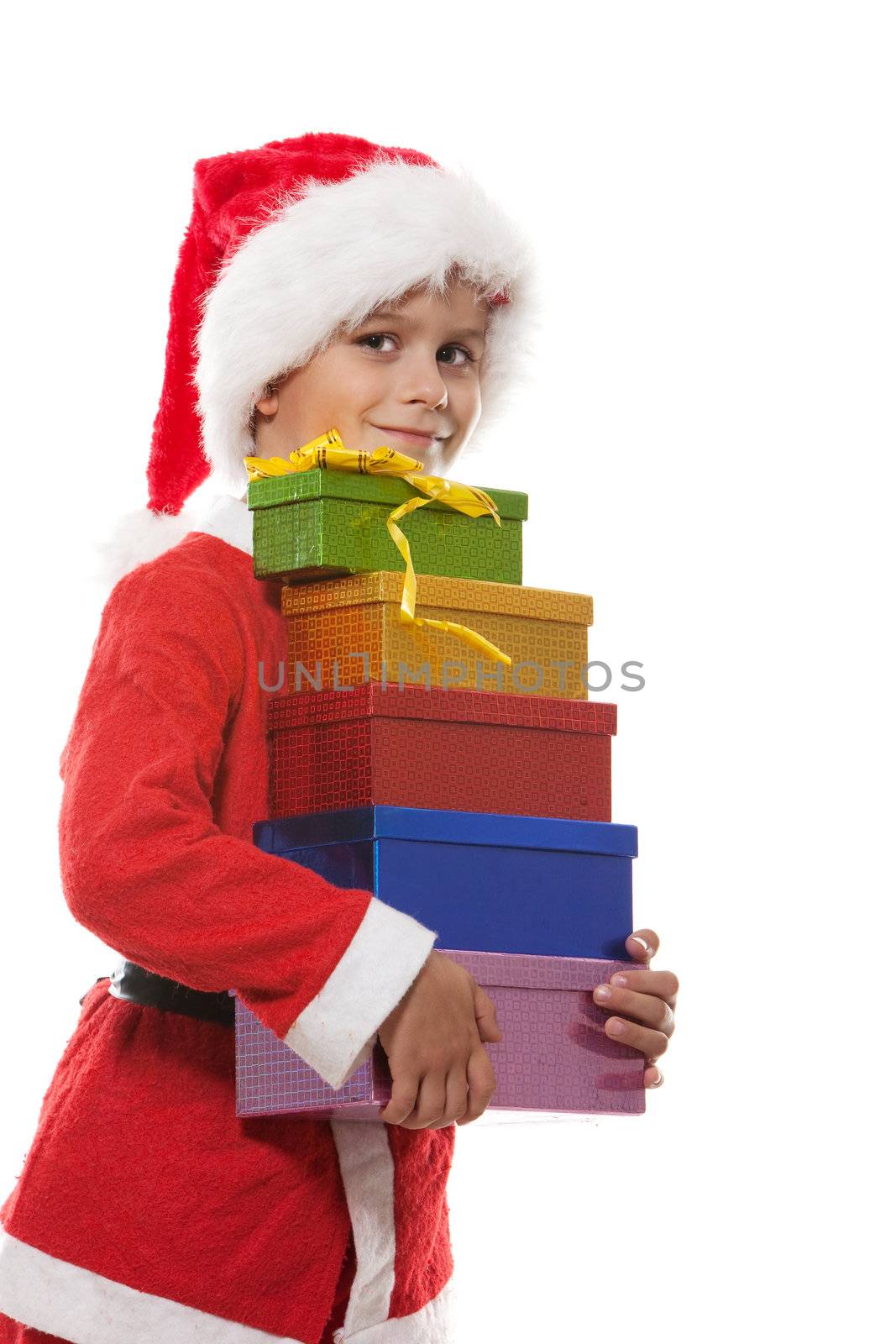 Boy holding a christmas gift isolated on white background