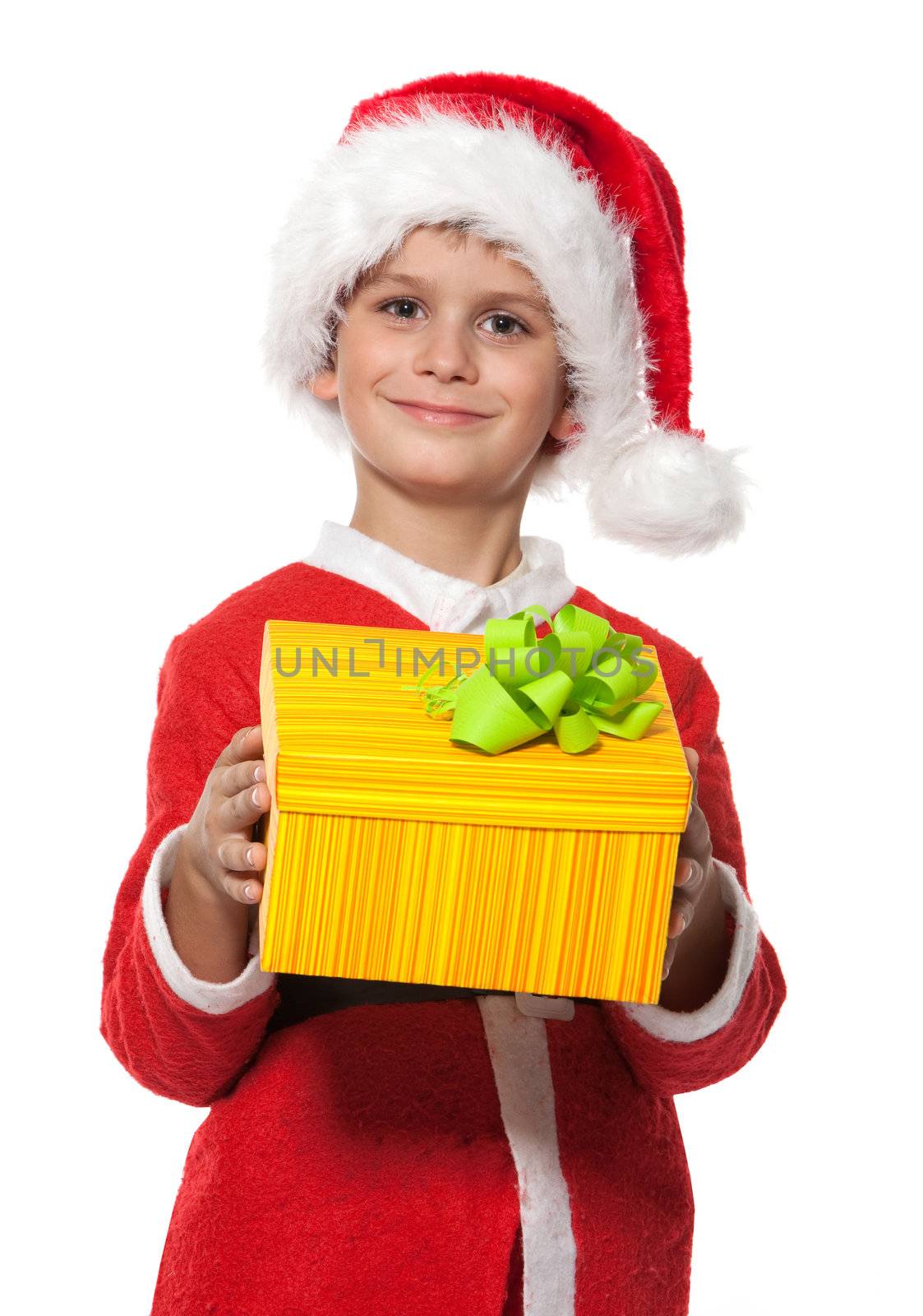 Boy holding a christmas gift isolated on white background