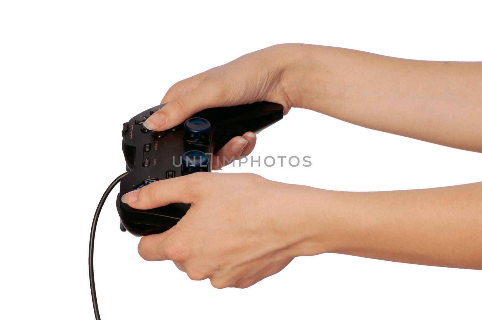 The girl plays a computer game with the help joypad