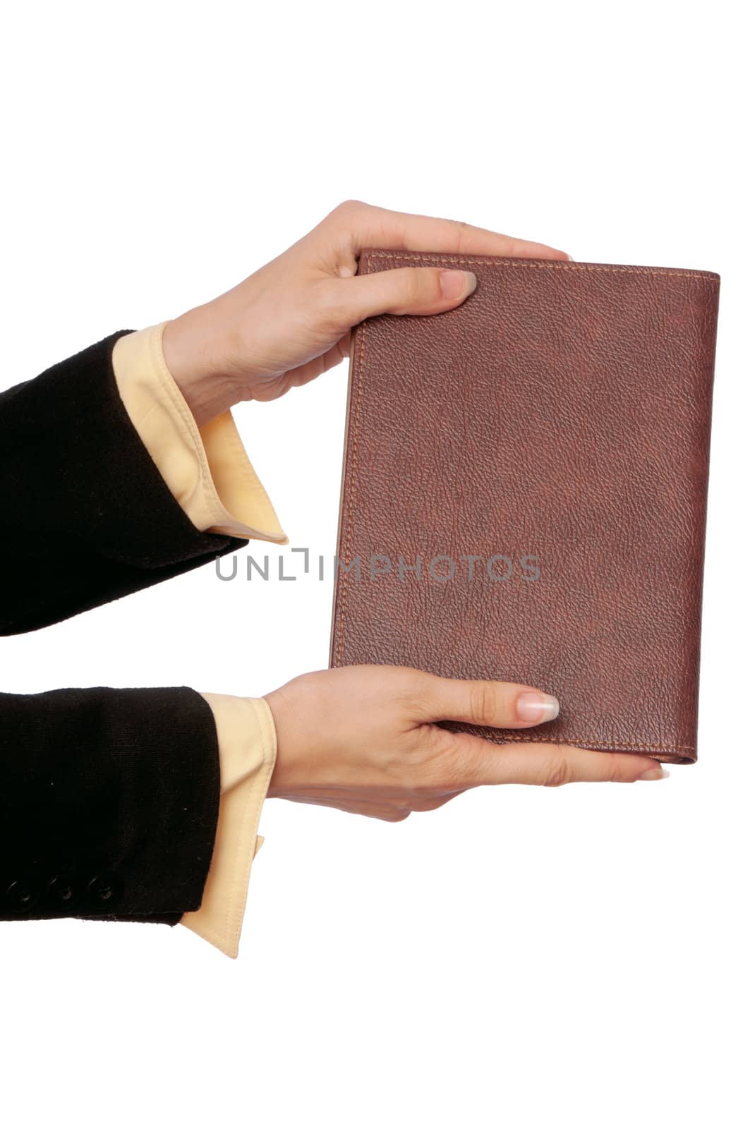The woman holds the business book for notes