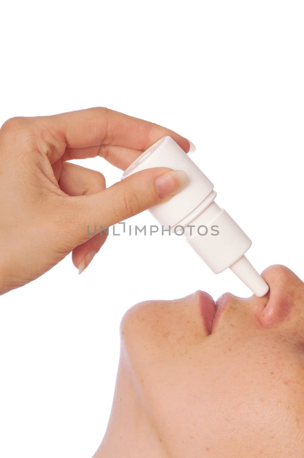 The woman drips drops for a nose for fast recover