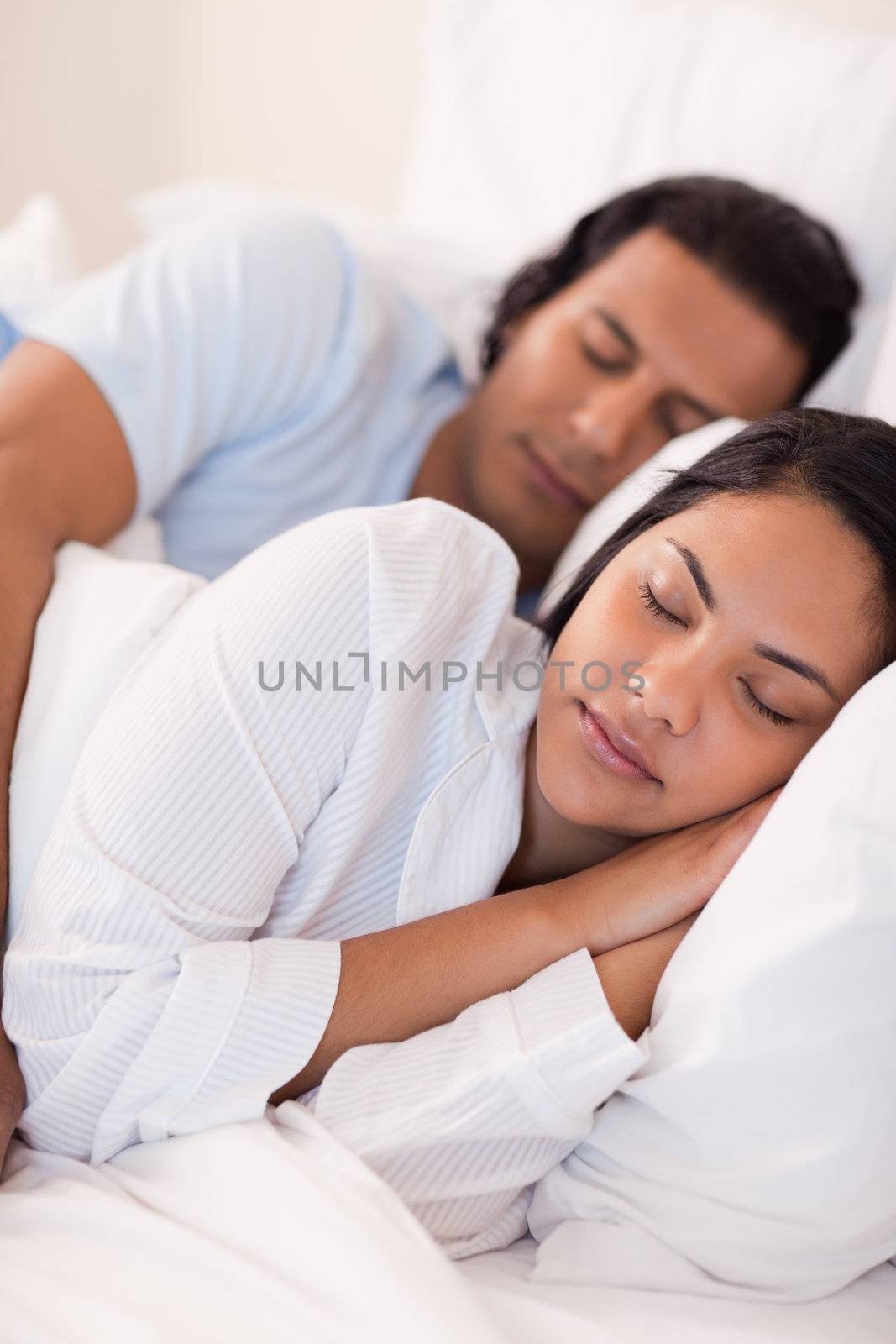 Young couple sleeping