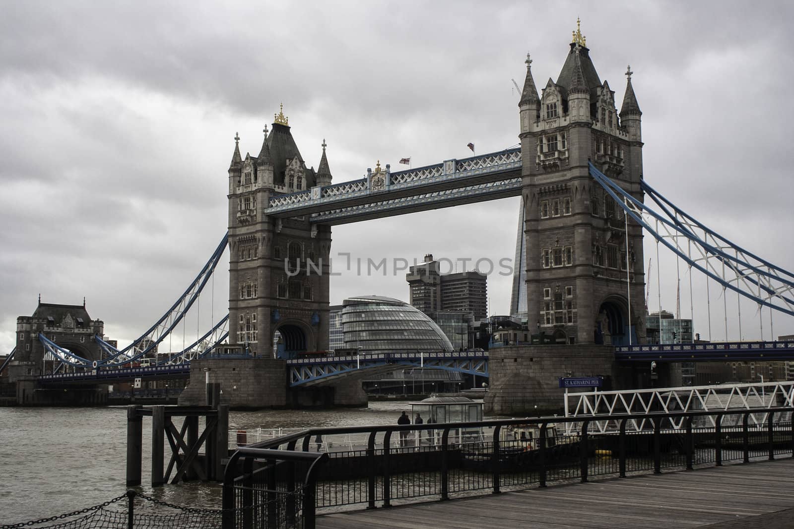 View of the Tower Bridge, London, an iconic landmark for the city, against a grey overcast winter sky