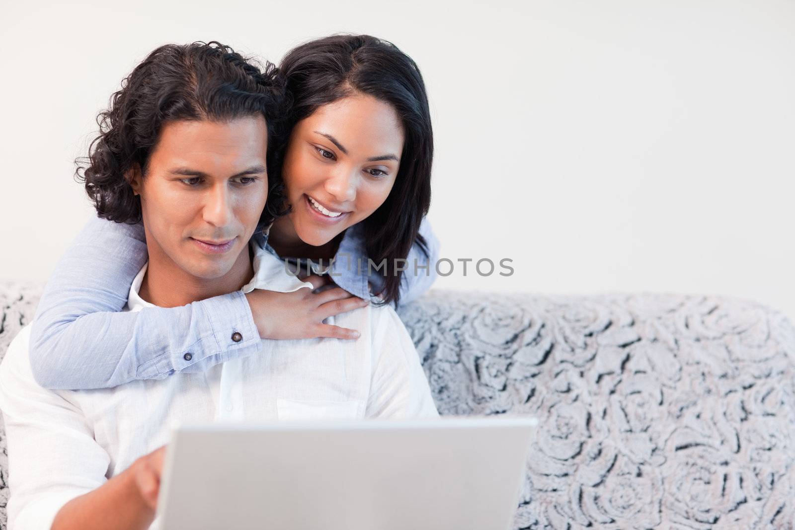 Young couple on the laptop together