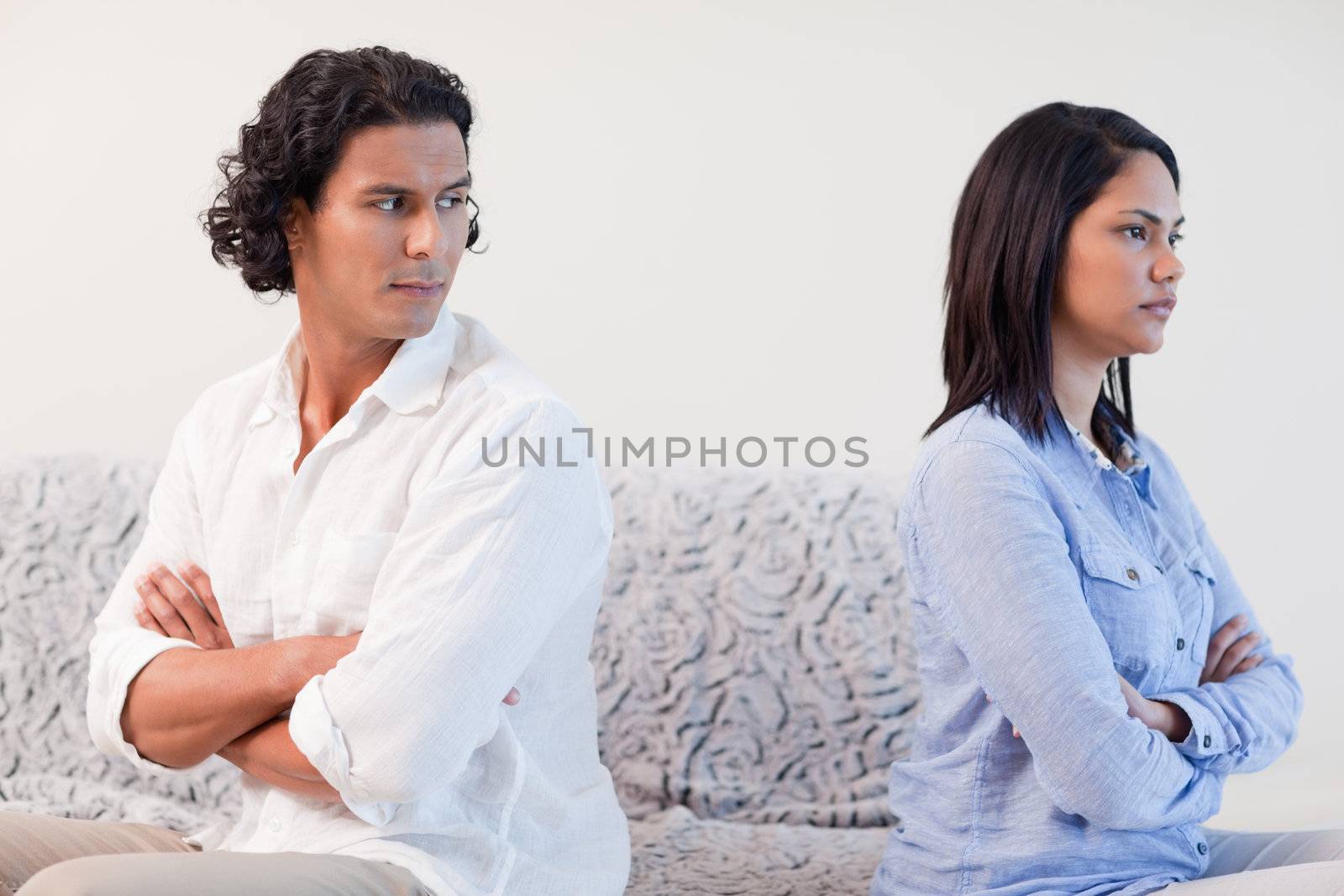 Young couple having a fight in the living room