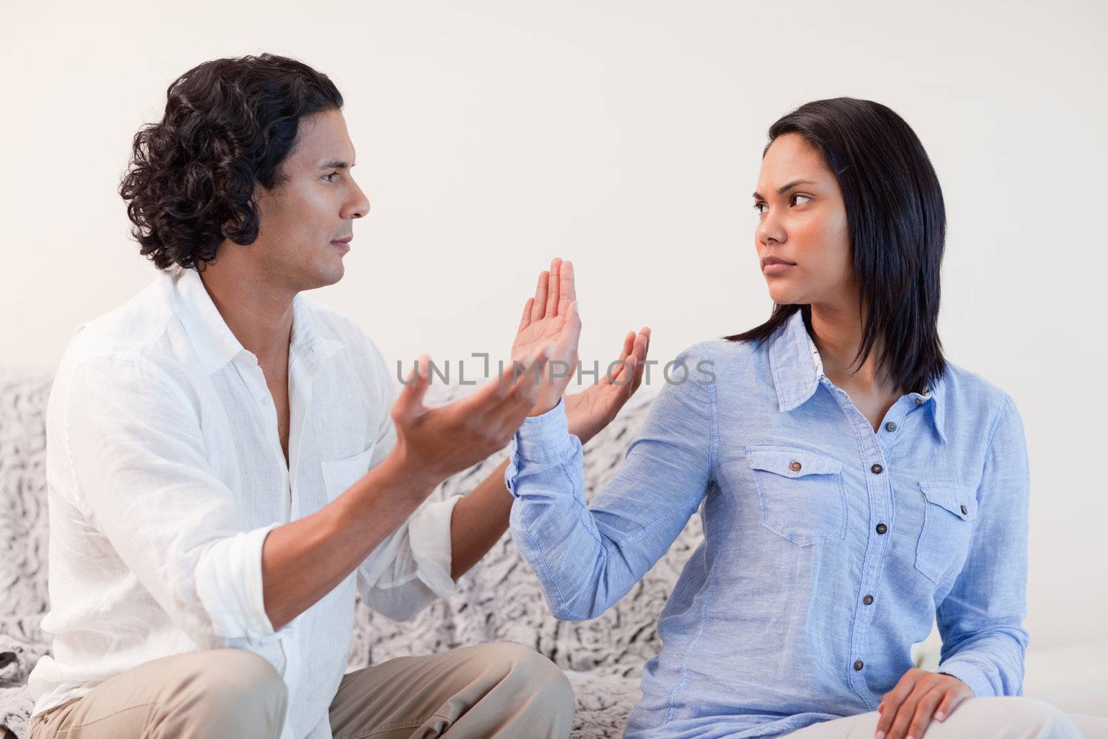 Young male begging his girlfriend for pardon