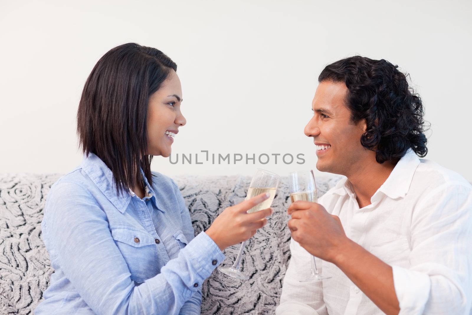 Young couple drinking sparkling wine