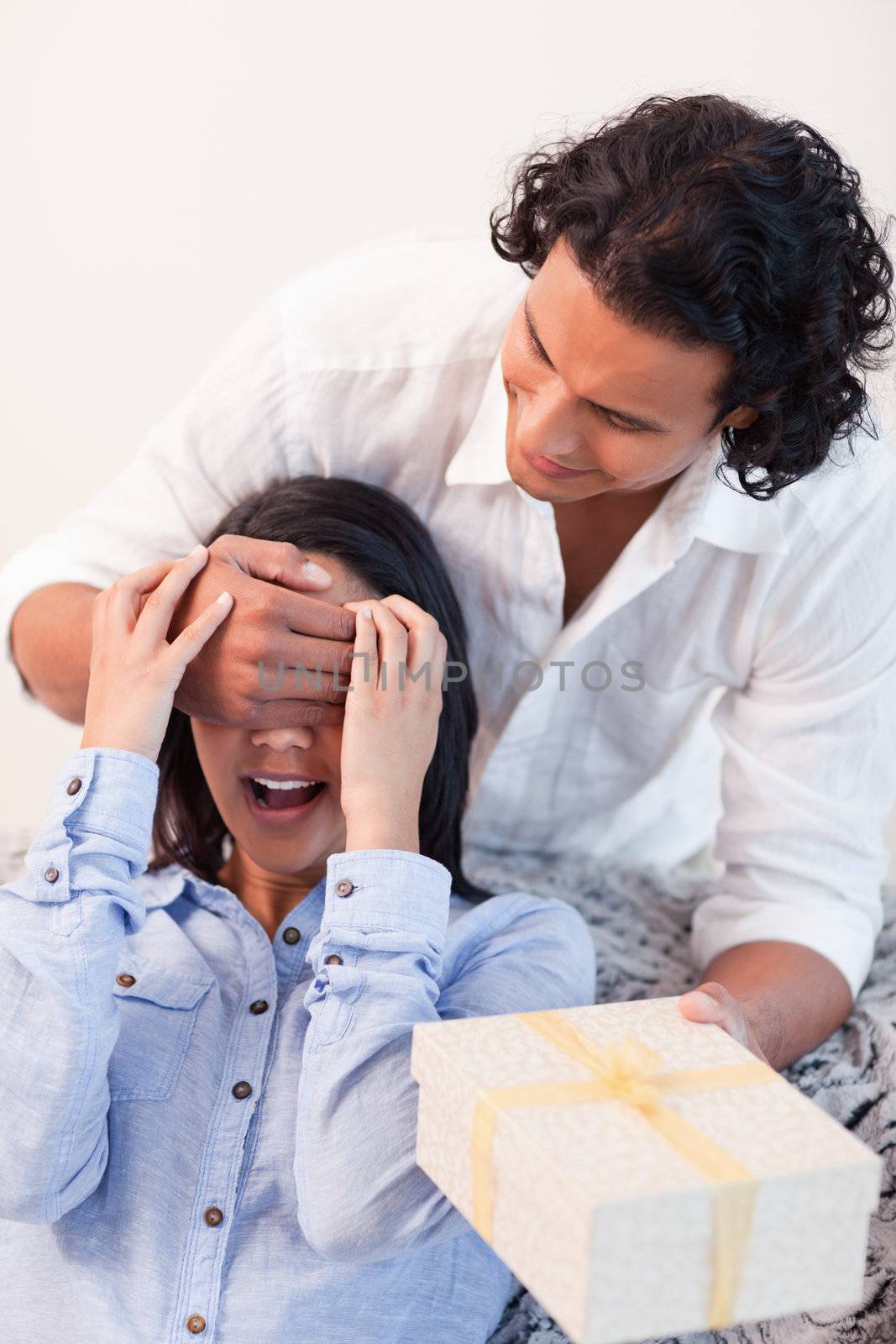 Young male having a little surprise for his girlfriend